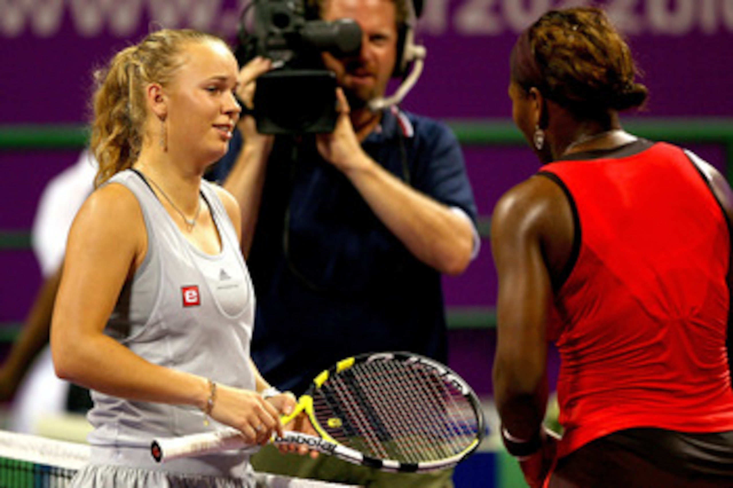 DOHA, QATAR - OCTOBER 31:  Caroline Wozniacki of Denmark retires from her match against Serena Williams of the United States during the semifinals of the Sony Ericsson WTA Championships at the Khalifa International Tennis and Squash Complex on October 31,