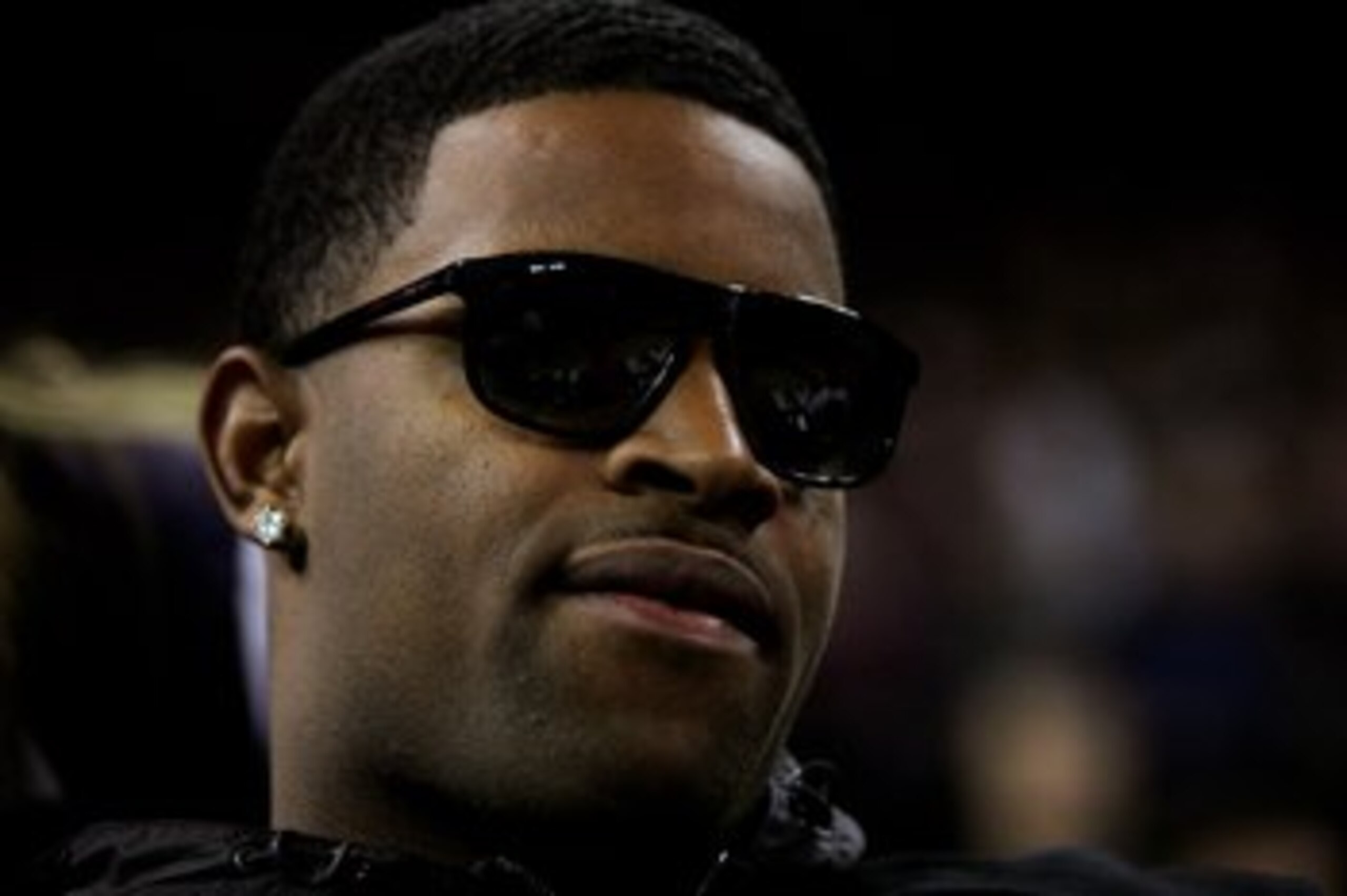 OAKLAND, CA - JANUARY 11:  San Francisco 49ers wide receiver Michael Crabtree watches the Cleveland Cavaliers play against the Golden State Warriors at Oracle Arena on January 11, 2010 in Oakland, California.  NOTE TO USER: User expressly acknowledges and