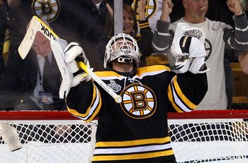 BOSTON, MA - JUNE 06:  Tim Thomas #30 of the Boston Bruins celebrates after defeating the Vancouver Canucks in Game Three of the 2011 NHL Stanley Cup Final at TD Garden on June 6, 2011 in Boston, Massachusetts. The Boston Bruins defeated the Vancouver Can