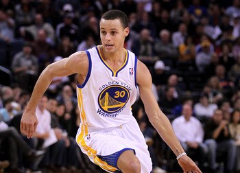 OAKLAND, CA - MARCH 25:  Stephen Curry #30 of the Golden State Warriors in action against the Toronto Raptors at Oracle Arena on March 25, 2011 in Oakland, California. NOTE TO USER: User expressly acknowledges and agrees that, by downloading and or using