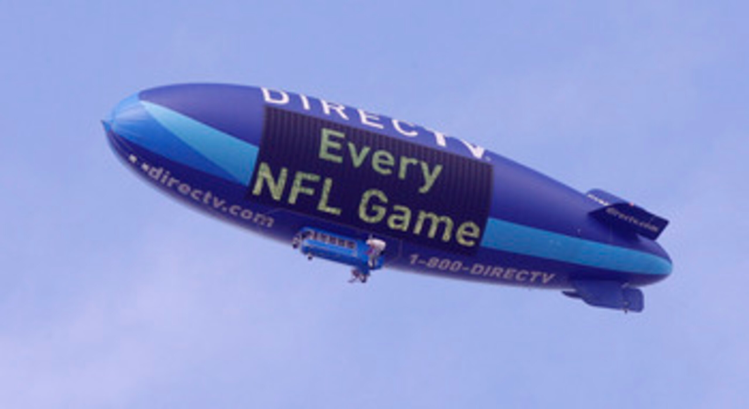 HOUSTON - NOVEMBER 28:  The DIrecTV blimp flies over Reliant Stadium on November 28, 2010 in Houston, Texas.  (Photo by Bob Levey/Getty Images)