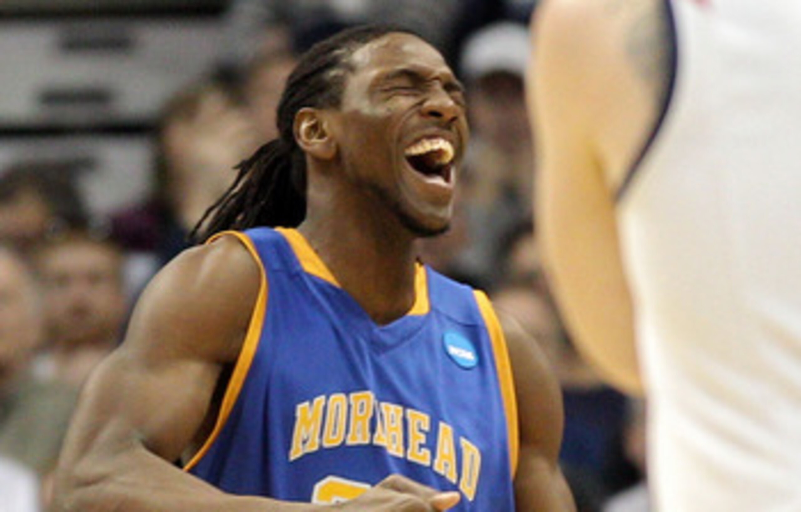 DENVER, CO - MARCH 19:  Kenneth Faried #35 of the Morehead State Eagles dunks reacts after a play against the Richmond Spiders during the third round of the 2011 NCAA men's basketball tournament at Pepsi Center on March 19, 2011 in Denver, Colorado.  (Pho