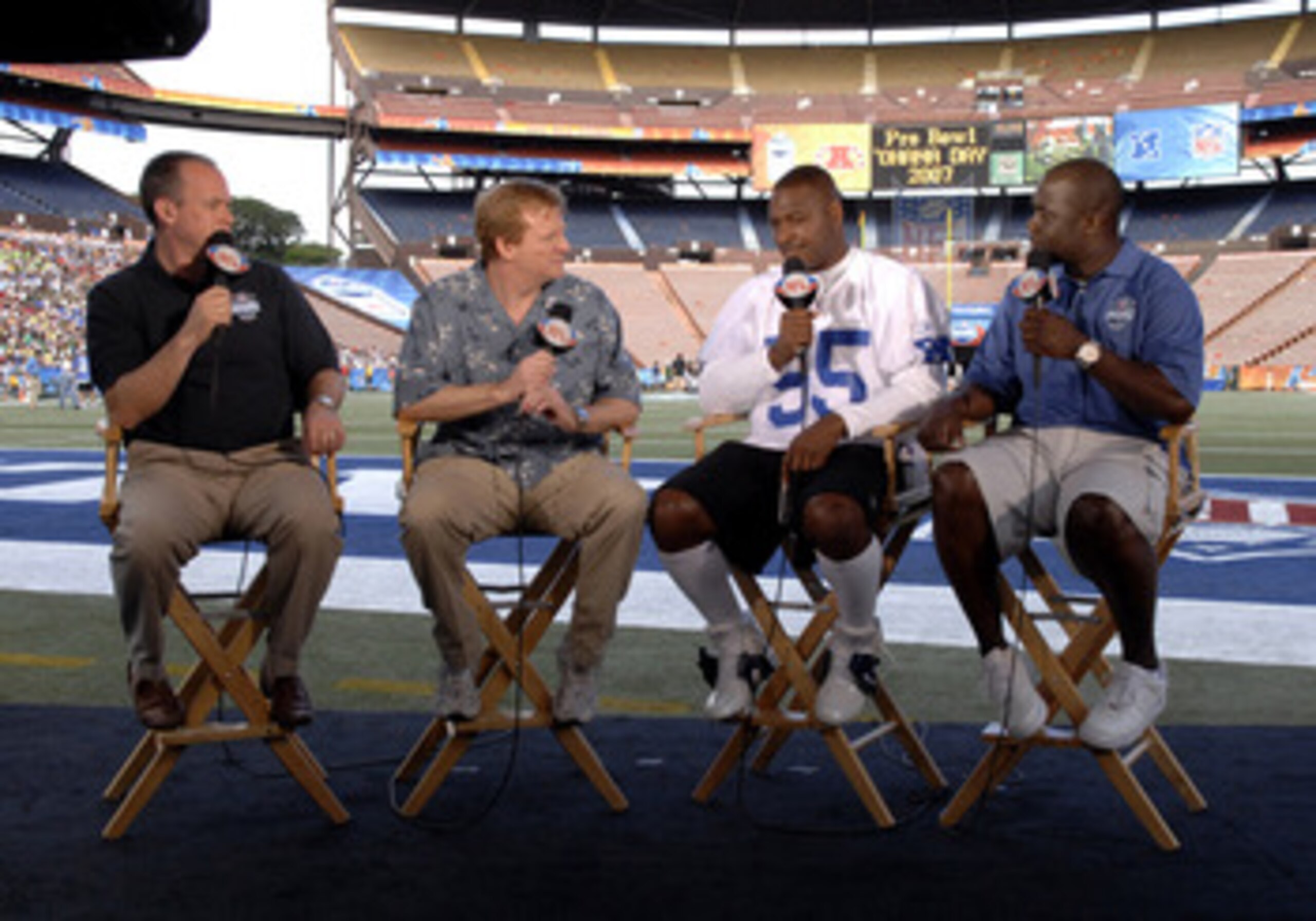 NFL commissioner Roger Goodell on the NFL Network set  during the Ohana Day  AFC practice for the 2007 Pro Bowl at Aloha Stadium, Honolulu, Hawaii on February 9, 2007.  Left to right: Rich Eisen; Goodell; Derrick Brooks and Marshall Faulk.  (Photo by Al M