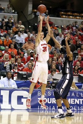 INDIANAPOLIS, IN - MARCH 11:  Jon Leuer #30 of the Wisconsin Badgers attempts a shot against the Penn State Nittany Lions during the quarterfinals of the 2011 Big Ten Men's Basketball Tournament at Conseco Fieldhouse on March 11, 2011 in Indianapolis, Ind