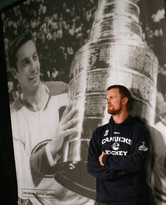 VANCOUVER, BC - MAY 31:  Henrik Sedin #33 of the Vancouver Canucks takes a break following a media session the day before the opening game of the 2011 NHL Stanley Cup Finals at the Rogers Arena on May 31, 2011 in Vancouver, Canada.  (Photo by Bruce Bennet