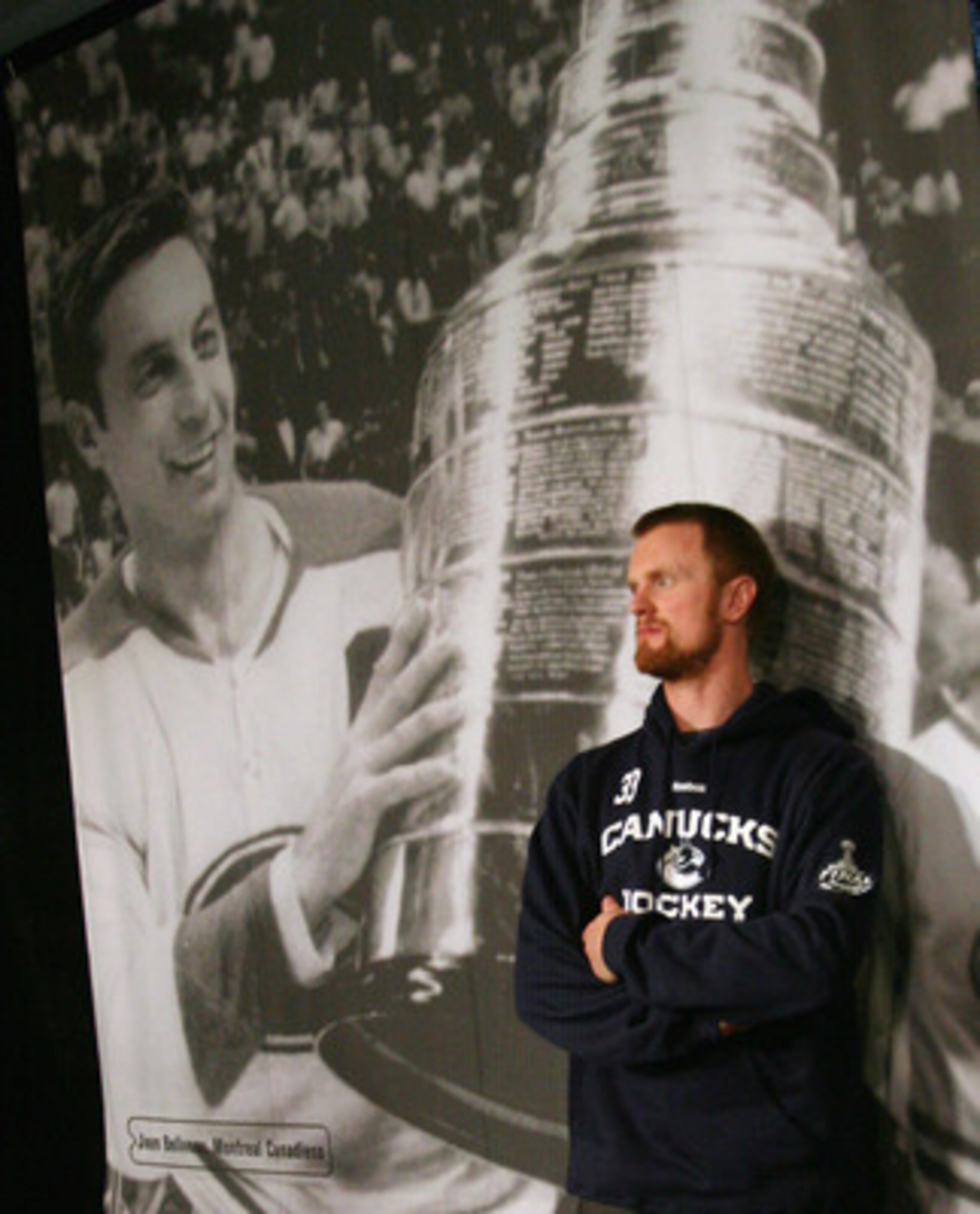 VANCOUVER, BC - MAY 31:  Henrik Sedin #33 of the Vancouver Canucks takes a break following a media session the day before the opening game of the 2011 NHL Stanley Cup Finals at the Rogers Arena on May 31, 2011 in Vancouver, Canada.  (Photo by Bruce Bennet