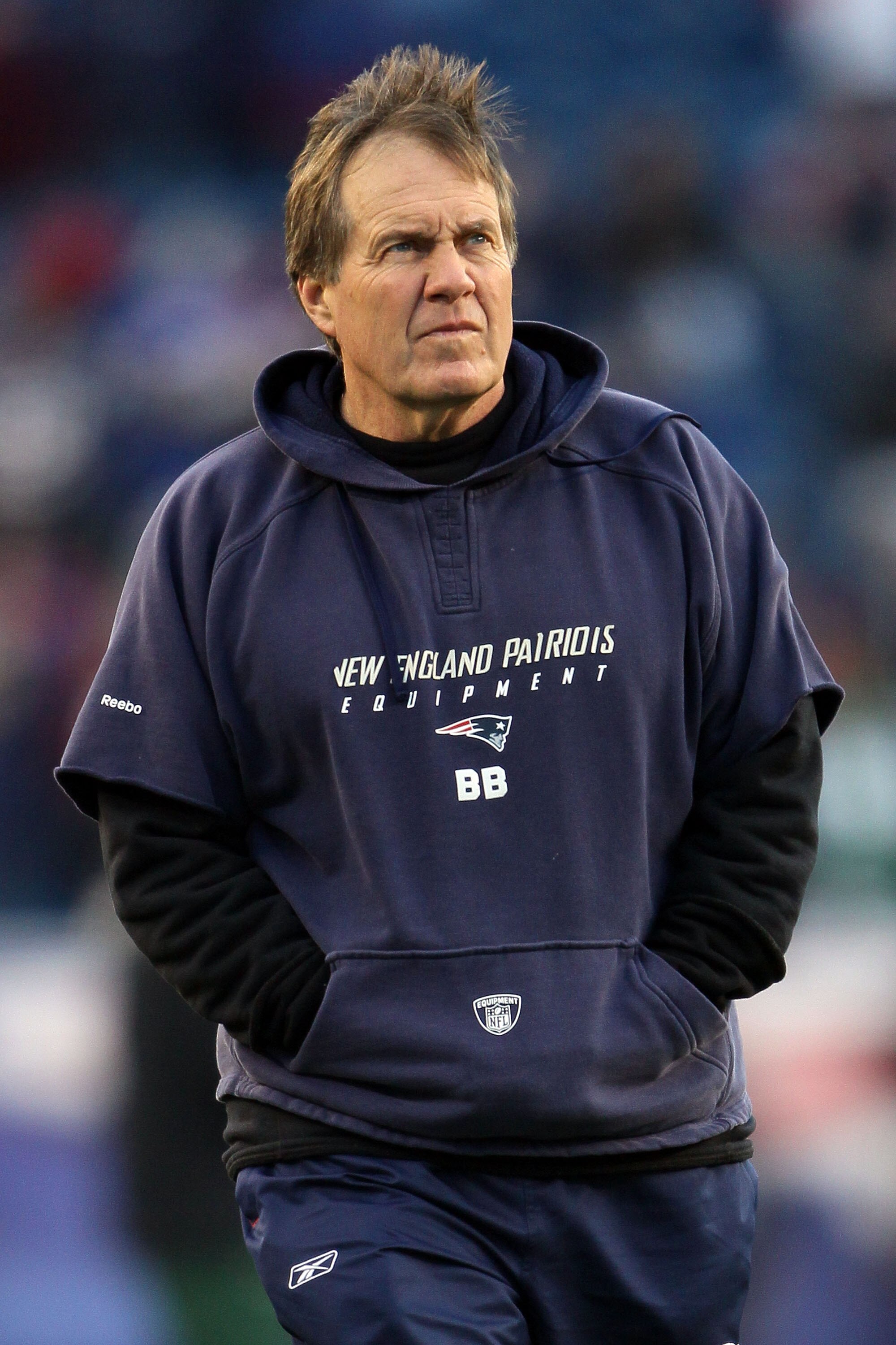 FOXBORO, MA - JANUARY 16: Head coach Bill Belichick of the New England Patriots looks on during their 2011 AFC divisional playoff game against the New York Jets at Gillette Stadium on January 16, 2011 in Foxboro, Massachusetts. (Photo by Elsa/Getty Imag FOXBORO, MA - JANUARY 16: Head coach Bill Belichick of the New England Patriots looks on during their 2011 AFC divisional playoff game against the New York Jets at Gillette Stadium on January 16, 2011 in Foxboro, Massachusetts. (Photo by Elsa/Getty Imag