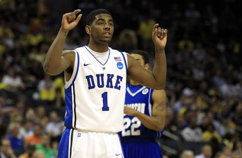 CHARLOTTE, NC - MARCH 18:  Kyrie Irving #1 of the Duke Blue Devils looks on while taking on the Hampton Pirates during the second round of the 2011 NCAA men's basketball tournament at Time Warner Cable Arena on March 18, 2011 in Charlotte, North Carolina.