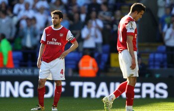 BOLTON, ENGLAND - APRIL 24: Cesc Fabregas of Arsenal looks dejected at the end of the Barclays Premier League match between Bolton Wanderers and Arsenal at the Reebok Stadium on April 24, 2011 in Bolton, England. (Photo by Clive Brunskill/Getty Images) BOLTON, ENGLAND - APRIL 24: Cesc Fabregas of Arsenal looks dejected at the end of the Barclays Premier League match between Bolton Wanderers and Arsenal at the Reebok Stadium on April 24, 2011 in Bolton, England. (Photo by Clive Brunskill/Getty Images)