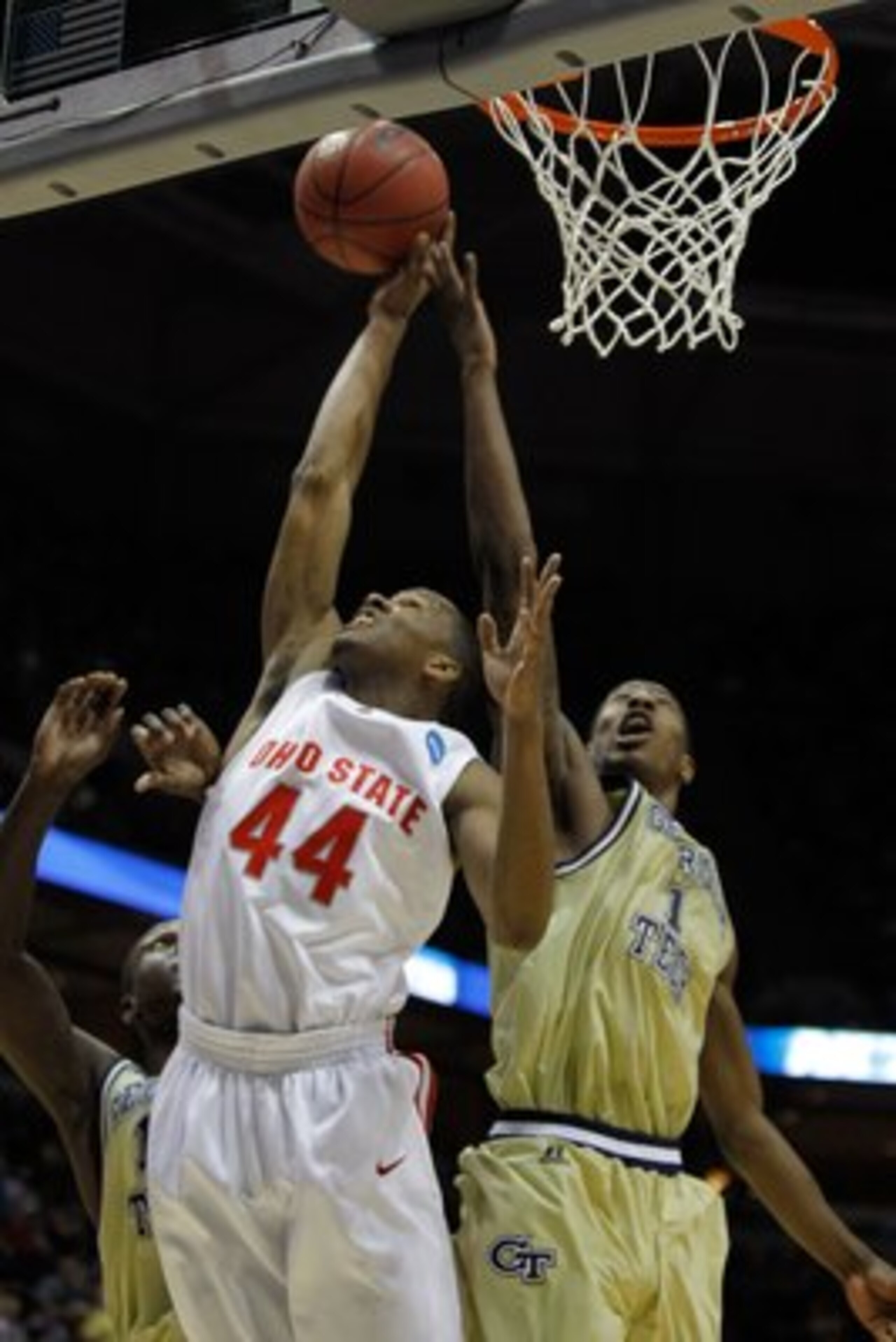 MILWAUKEE - MARCH 21:  William Buford #44 of the Ohio State Buckeyes goes up for a rebound against Iman Shumpert #1 of the Georgia Tech Yellow Jackets during the second round of the 2010 NCAA men's basketball tournament at the Bradley Center on March 21,