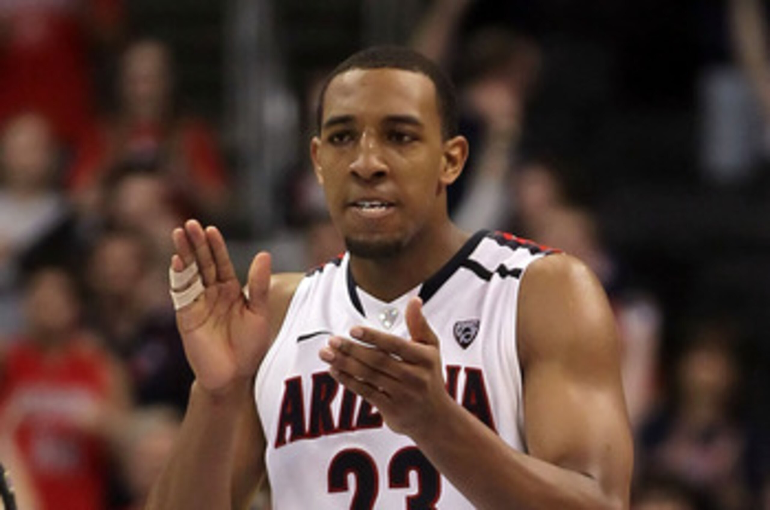 LOS ANGELES, CA - MARCH 12:  Derrick Williams #23 of the Arizona Wildcats reacts in the second half while taking on the Washington Huskies in the championship game of the 2011 Pacific Life Pac-10 Men's Basketball Tournament at Staples Center on March 12,