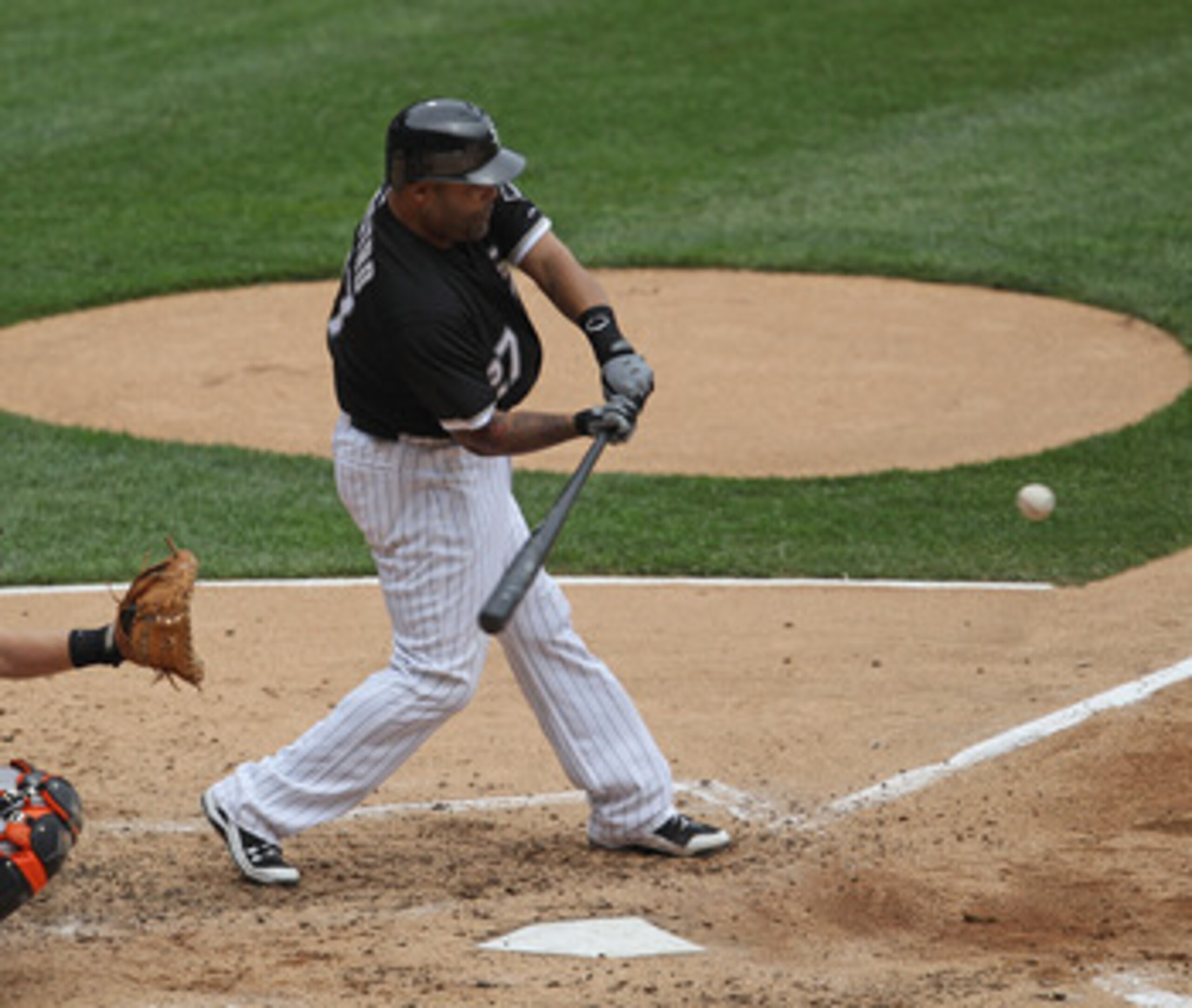 CHICAGO, IL - MAY 01: Ramon Castro #27 of the Chicago White Sox hits the ball against the Baltimore Orioles at U.S. Cellular Field on May 1, 2011 in Chicago, Illinois. The Orioles defeated the White Sox 6-4. (Photo by Jonathan Daniel/Getty Images)