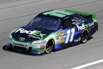 LAS VEGAS, NV - MARCH 04:  Denny Hamlin drives the #11 FedEx Ground Toyota during practice for the NASCAR Sprint Cup Series Kobalt Tools 400 at Las Vegas Motor Speedway on March 4, 2011 in Las Vegas, Nevada.  (Photo by John Harrelson/Getty Images for NASC