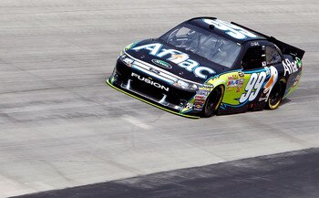 DOVER, DE - MAY 13:  Carl Edwards drives the #99 Aflac Ford during practice for the NASCAR Sprint Cup Series FedEx 400 Benefiting Autism Speaks at Dover International Speedway on May 13, 2011 in Dover, Delaware.  (Photo by Jeff Zelevansky/Getty Images for