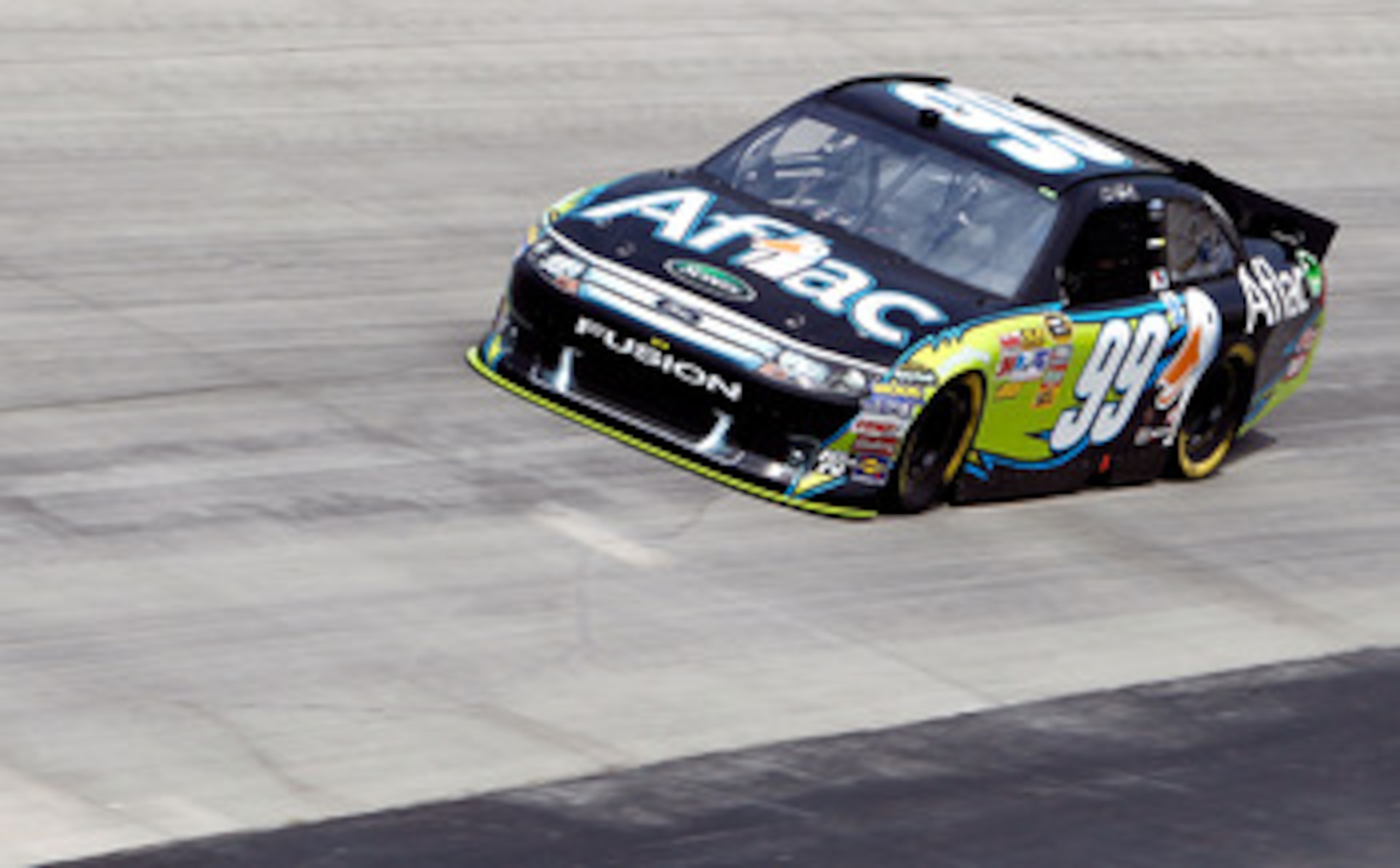 DOVER, DE - MAY 13:  Carl Edwards drives the #99 Aflac Ford during practice for the NASCAR Sprint Cup Series FedEx 400 Benefiting Autism Speaks at Dover International Speedway on May 13, 2011 in Dover, Delaware.  (Photo by Jeff Zelevansky/Getty Images for