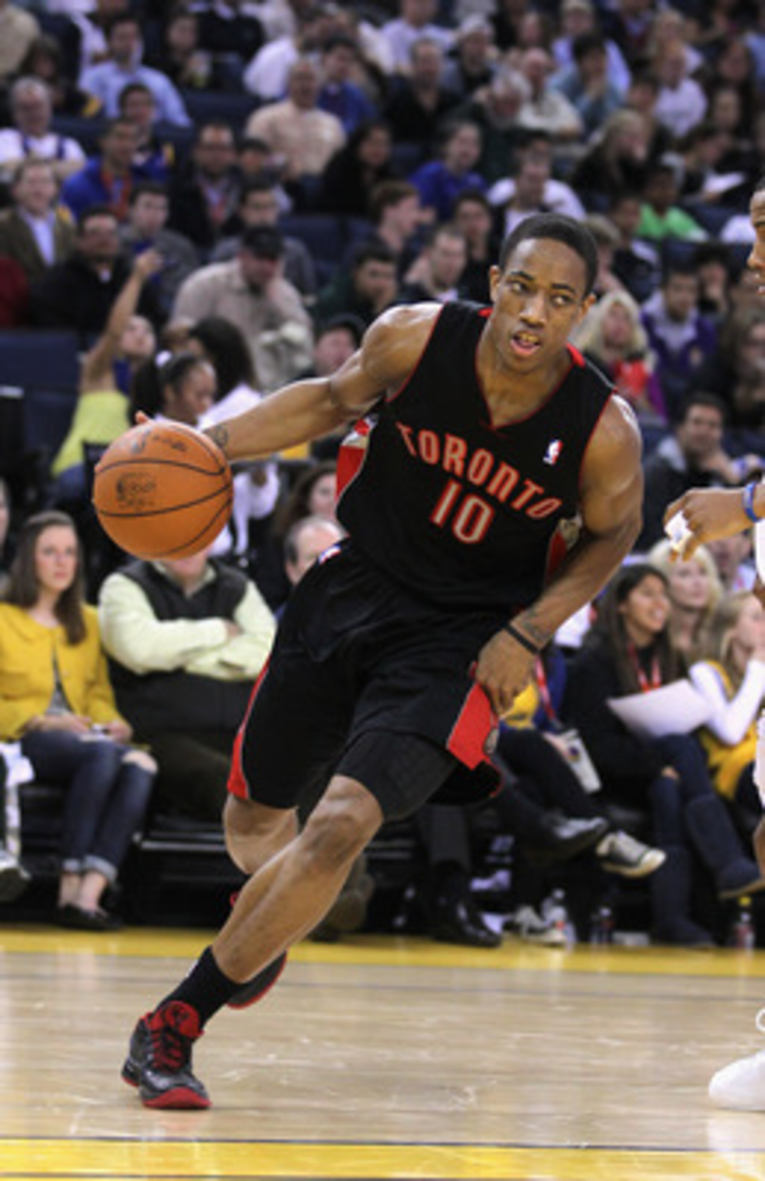 OAKLAND, CA - MARCH 25: DeMar DeRozan #10 of the Toronto Raptors in action against the Golden State Warriors at Oracle Arena on March 25, 2011 in Oakland, California. NOTE TO USER: User expressly acknowledges and agrees that, by downloading and or using t