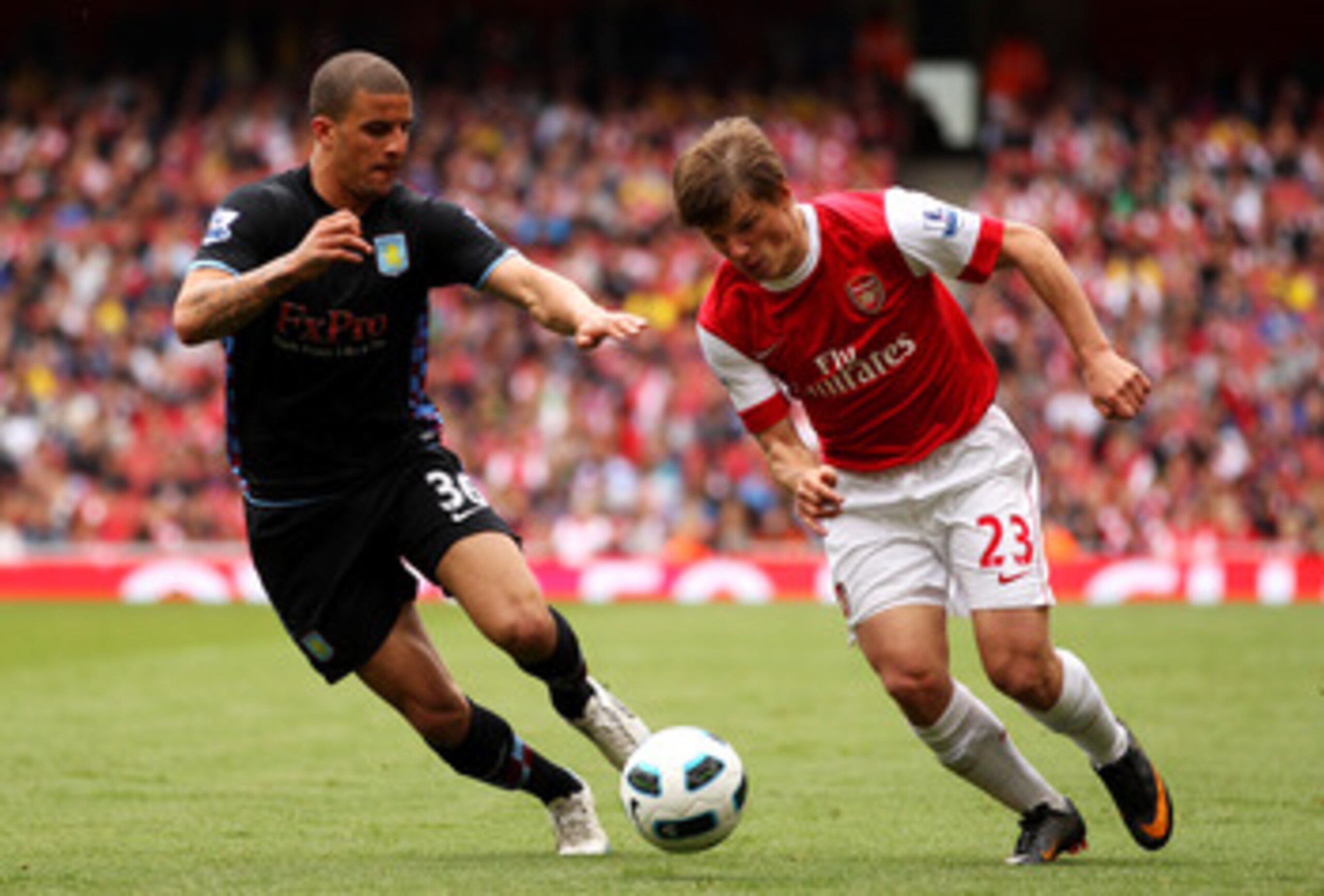 LONDON, ENGLAND - MAY 15:  Andrey Arshavin (R) of Arsenal in action against Kyle Walker of Aston Villa during the Barclays Premier League match between Arsenal and Aston Villa at the Emirates Stadium on May 15, 2011 in London, England.  (Photo by Richard