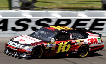 KANSAS CITY, KS - JUNE 05:  Greg Biffle, driver of the #16 3M/Walgreens Ford, races during the NASCAR Sprint Cup Series STP 400 at Kansas Speedway on June 5, 2011 in Kansas City, Kansas.  (Photo by Jerry Markland/Getty Images for NASCAR)
