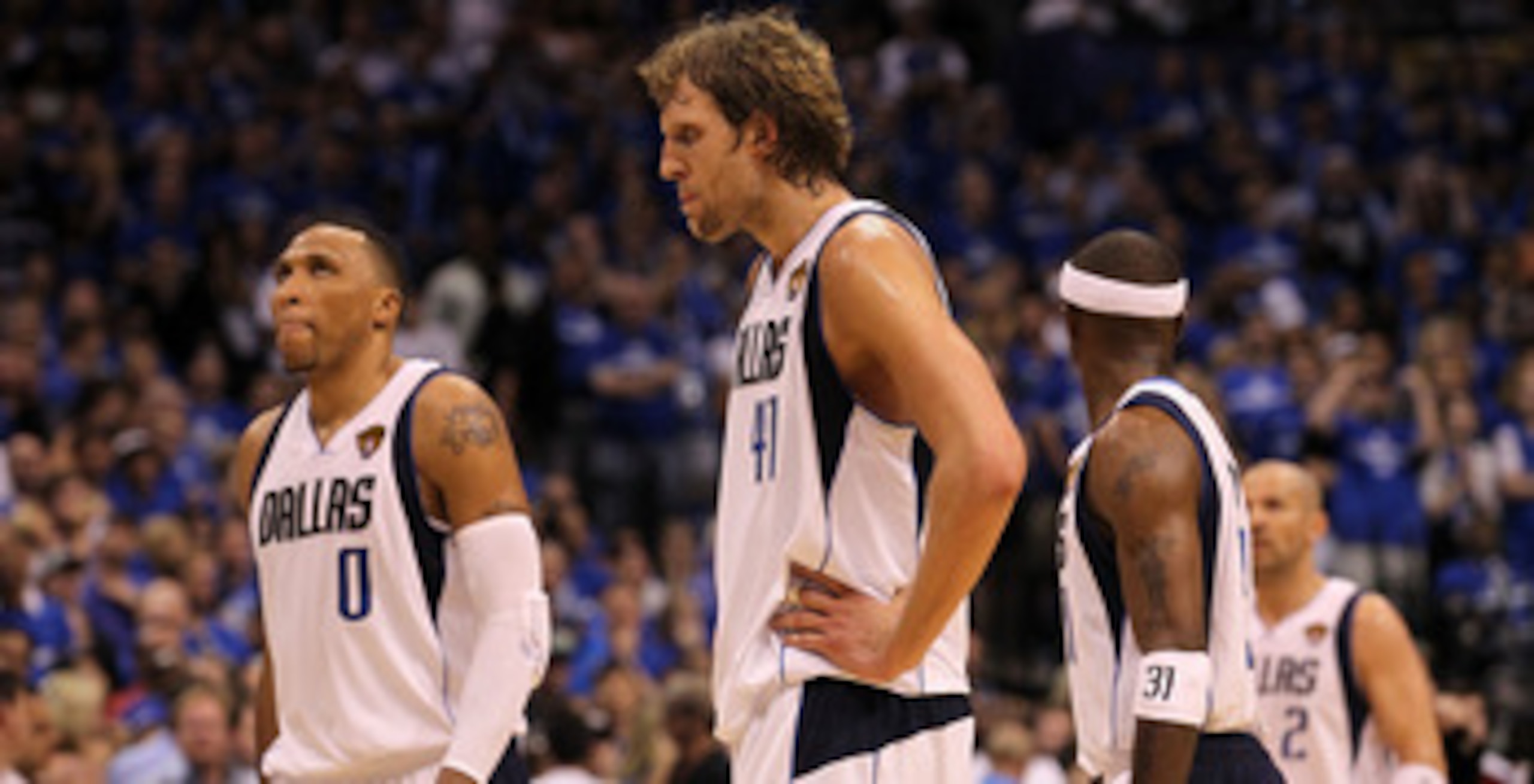 DALLAS, TX - JUNE 05:  (L-R) Shawn Marion #0, Dirk Nowitzki #41, Jason Terry #31 and Jason Kidd #2 of the Dallas Mavericks walk towards the bench against the Miami Heat in Game Three of the 2011 NBA Finals at American Airlines Center on June 5, 2011 in Da