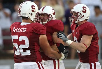 PALO ALTO, CA - SEPTEMBER 26:  Toby Gerhart #7 of the Stanford Cardinal celebrates with David DeCastro #52 and Ryan Whalen #8 after scoring a touchdown against the Washington Huskies at Stanford Stadium on September 26, 2009 in Palo Alto, California.  (Ph