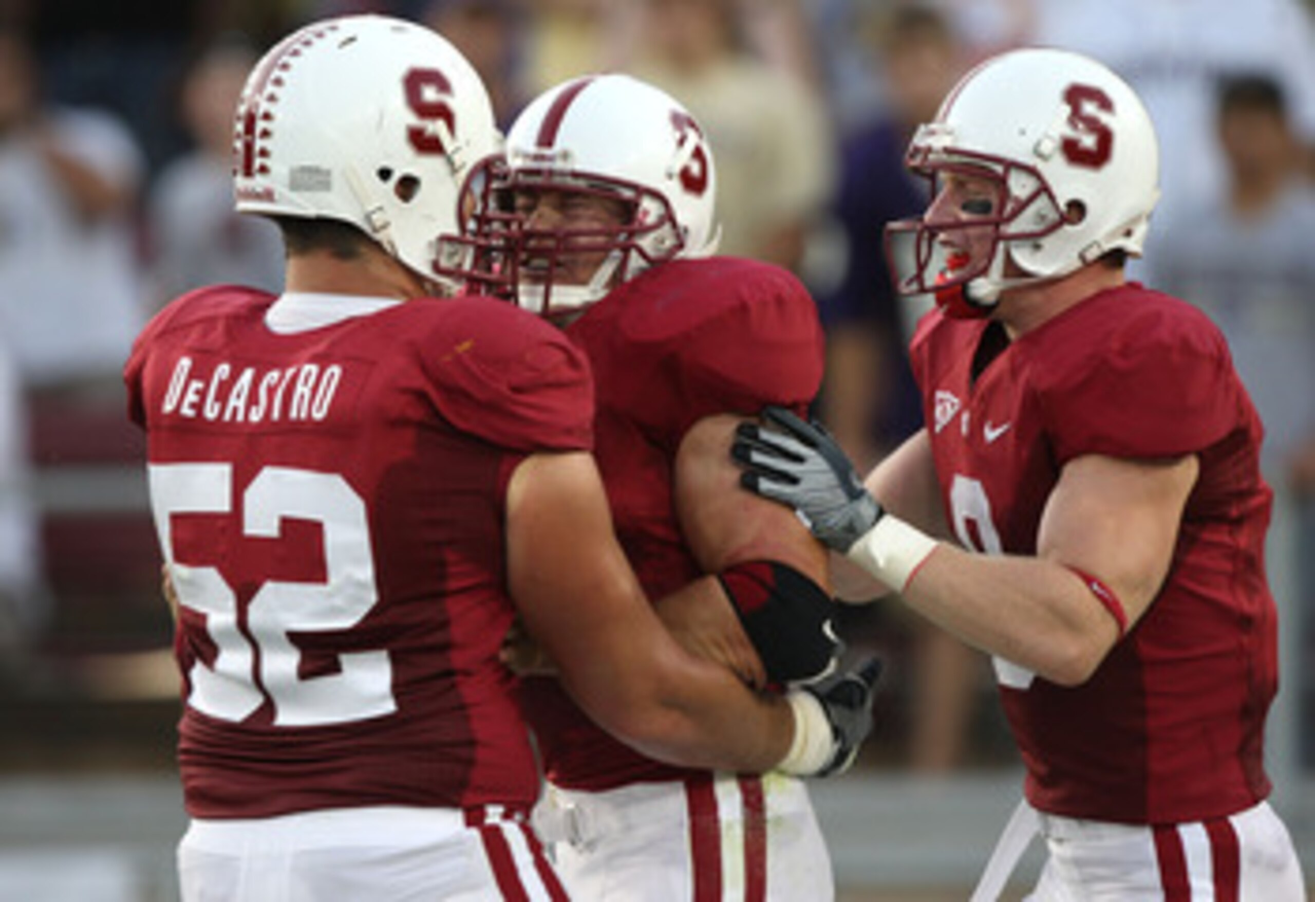 PALO ALTO, CA - SEPTEMBER 26:  Toby Gerhart #7 of the Stanford Cardinal celebrates with David DeCastro #52 and Ryan Whalen #8 after scoring a touchdown against the Washington Huskies at Stanford Stadium on September 26, 2009 in Palo Alto, California.  (Ph