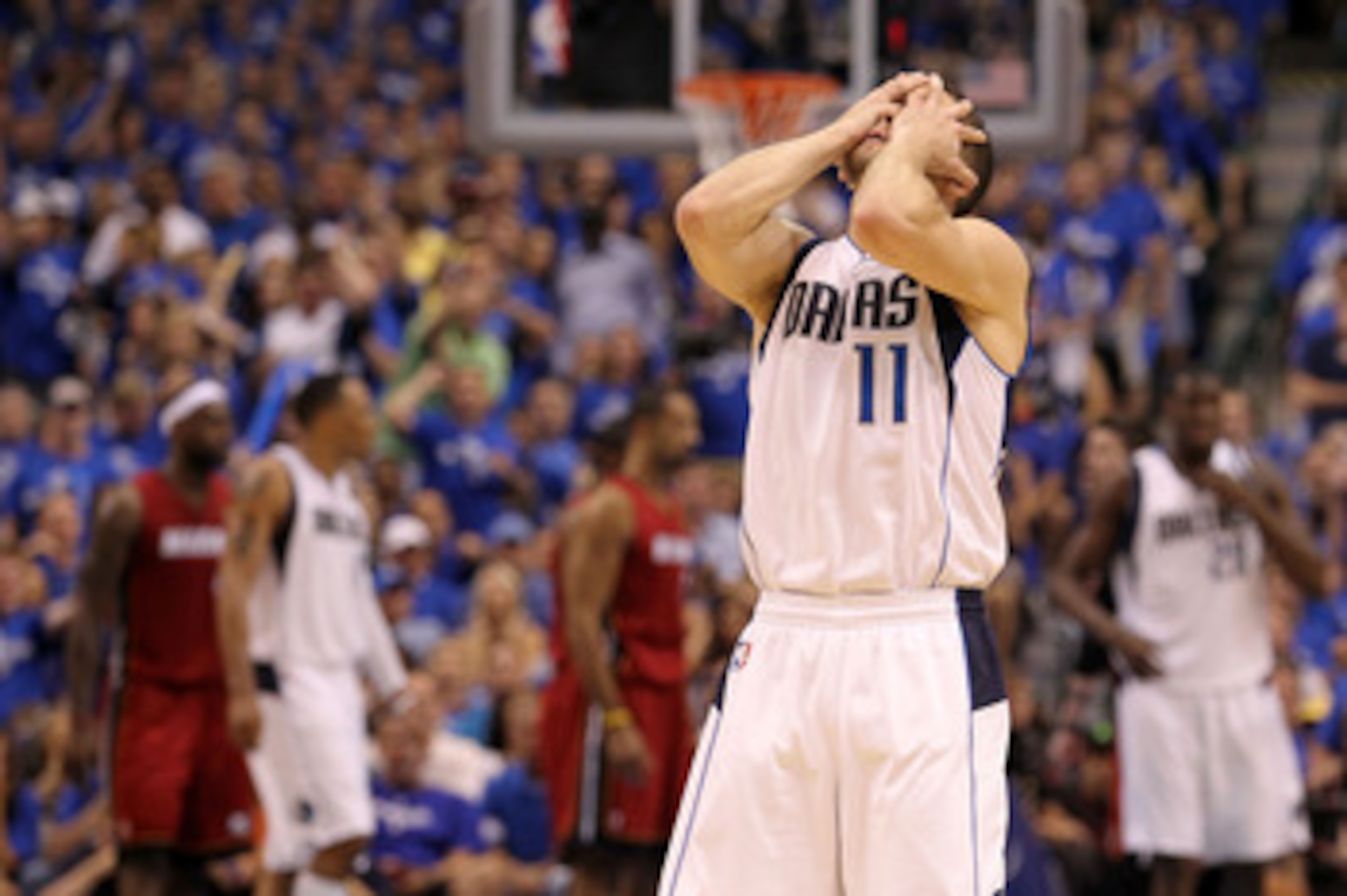 DALLAS, TX - JUNE 05:  Jose Juan Barea #11 of the Dallas Mavericks reacts while taking on the Miami Heat in the second half of Game Three of the 2011 NBA Finals at American Airlines Center on June 5, 2011 in Dallas, Texas.  NOTE TO USER: User expressly ac