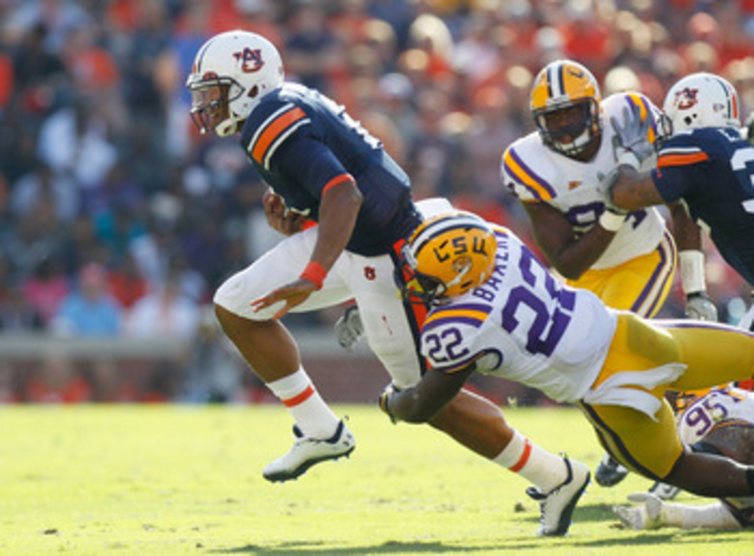 AUBURN, AL - OCTOBER 23:  Quarterback Cameron Newton #2 of the Auburn Tigers against Ryan Baker #22 of the LSU Tigers at Jordan-Hare Stadium on October 23, 2010 in Auburn, Alabama.  (Photo by Kevin C. Cox/Getty Images)