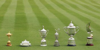 ABU DHABI, UNITED ARAB EMIRATES - JANUARY 23:  A unique collection of golf trophies (l-r) The Ryder Cup won by Europe in 2010, The Masters player replica trophy won by Phil Mickelson of the USA in 2010, The US Open trophy won by Graeme McDowell of Norther