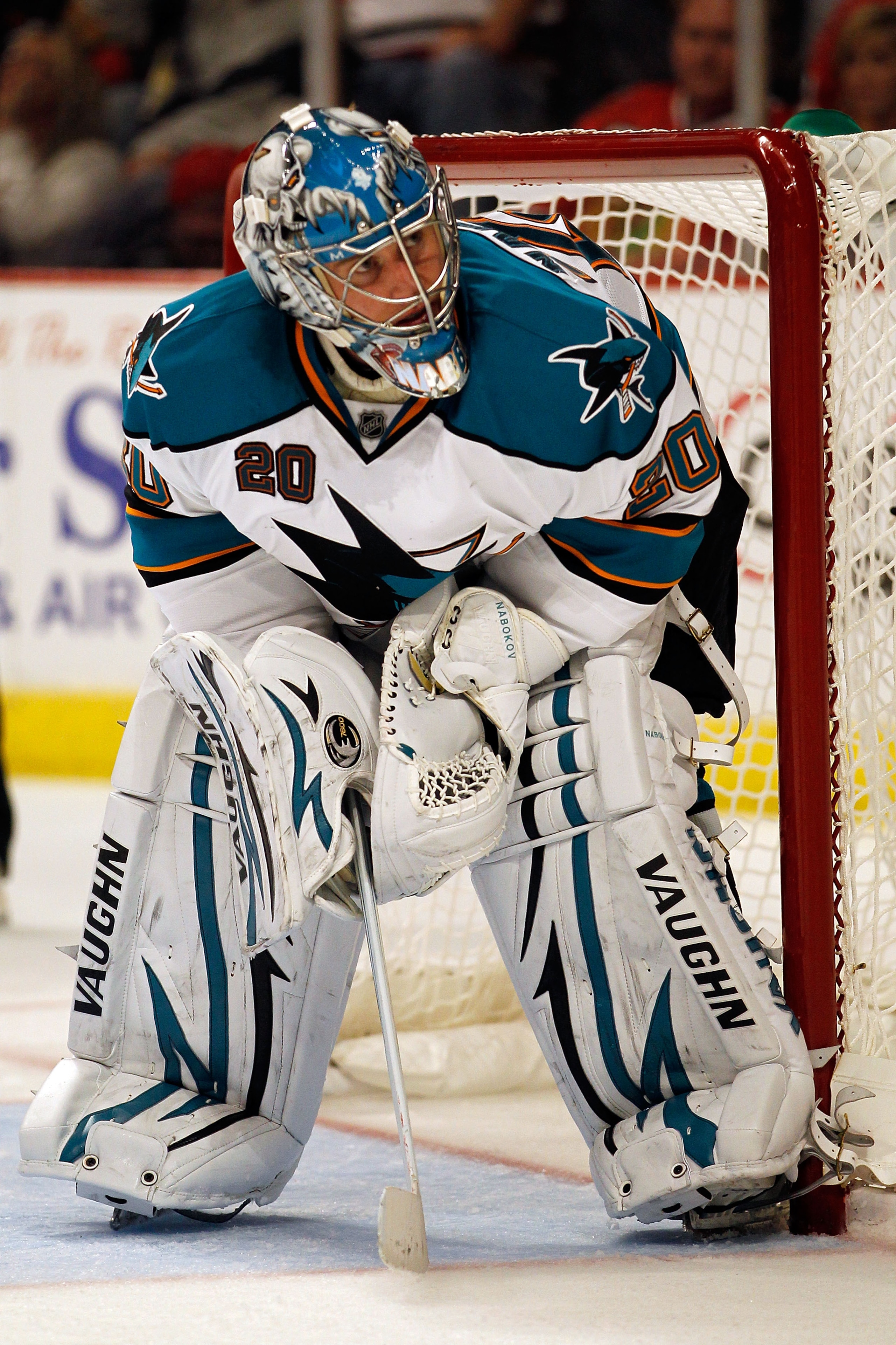 CHICAGO - MAY 21: Goaltender Evgeni Nabokov #20 of the San Jose Sharks in net in overtime while taking on the Chicago Blackhawks in Game Three of the Western Conference Finals during the 2010 NHL Stanley Cup Playoffs at the United Center on May 21, 2010 CHICAGO - MAY 21: Goaltender Evgeni Nabokov #20 of the San Jose Sharks in net in overtime while taking on the Chicago Blackhawks in Game Three of the Western Conference Finals during the 2010 NHL Stanley Cup Playoffs at the United Center on May 21, 2010