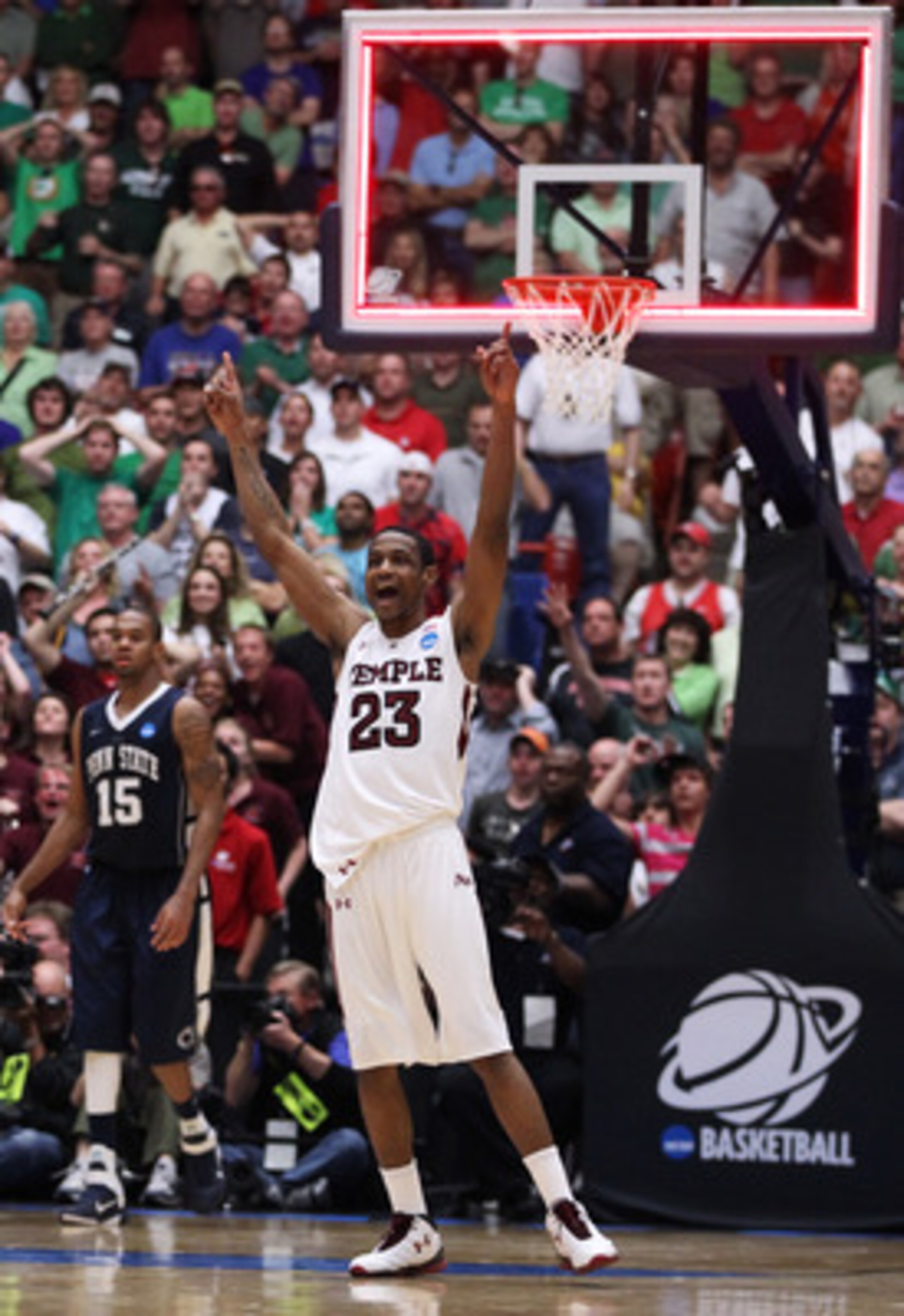 TUCSON, AZ - MARCH 17:  Ramone Moore #23 of the Temple Owls celebrates after they defeated the Penn State Nittany Lions 66 to 64 in the second round of the 2011 NCAA men's basketball tournament at McKale Center on March 17, 2011 in Tucson, Arizona.  (Phot