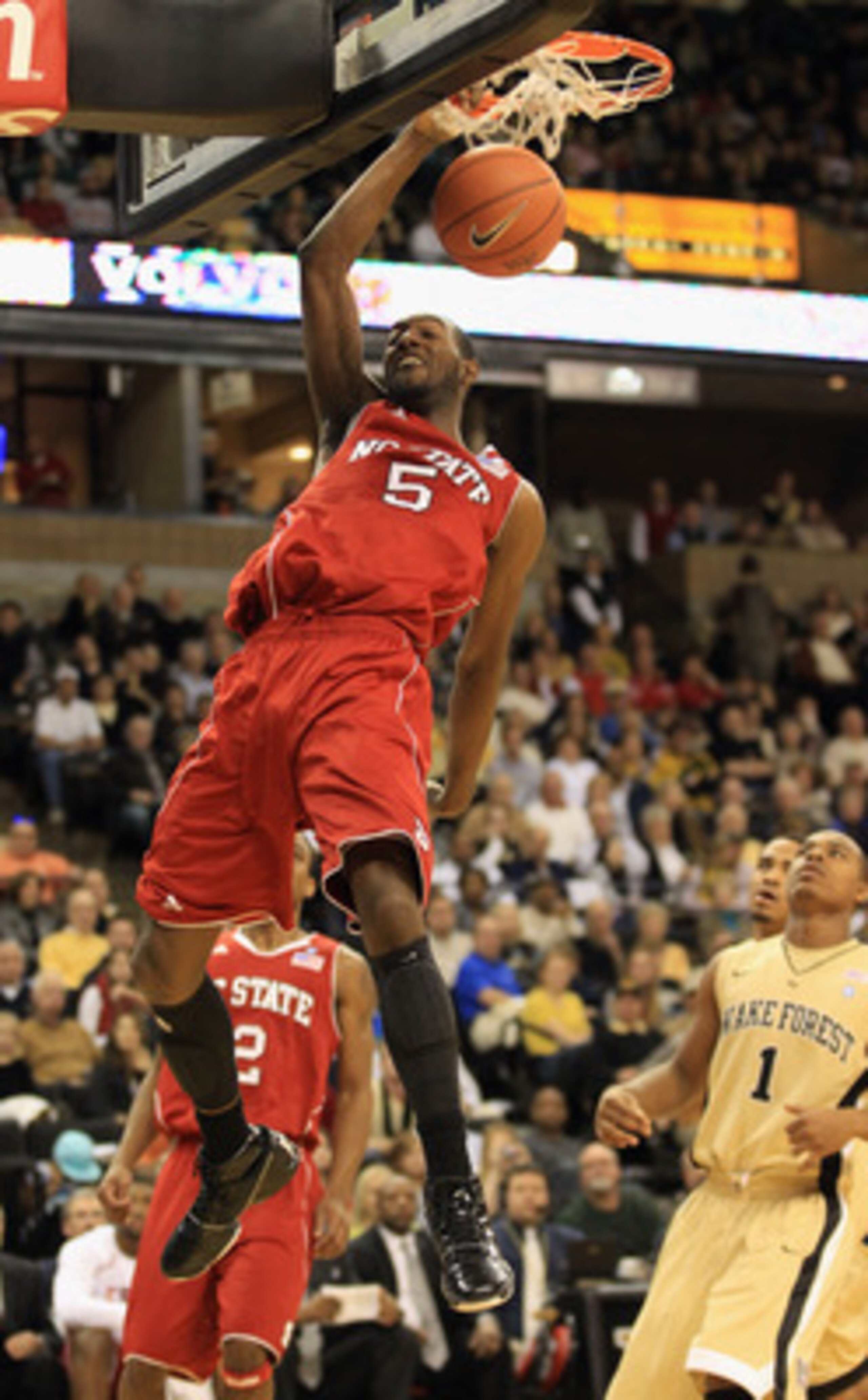 WINSTON SALEM, NC - FEBRUARY 13:  C.J. Leslie #5 of the North Carolina State Wolfpack dunks the ball against the Wake Forest Demon Deacons during their game at Lawrence Joel Coliseum on February 13, 2011 in Winston Salem, North Carolina.  (Photo by Street