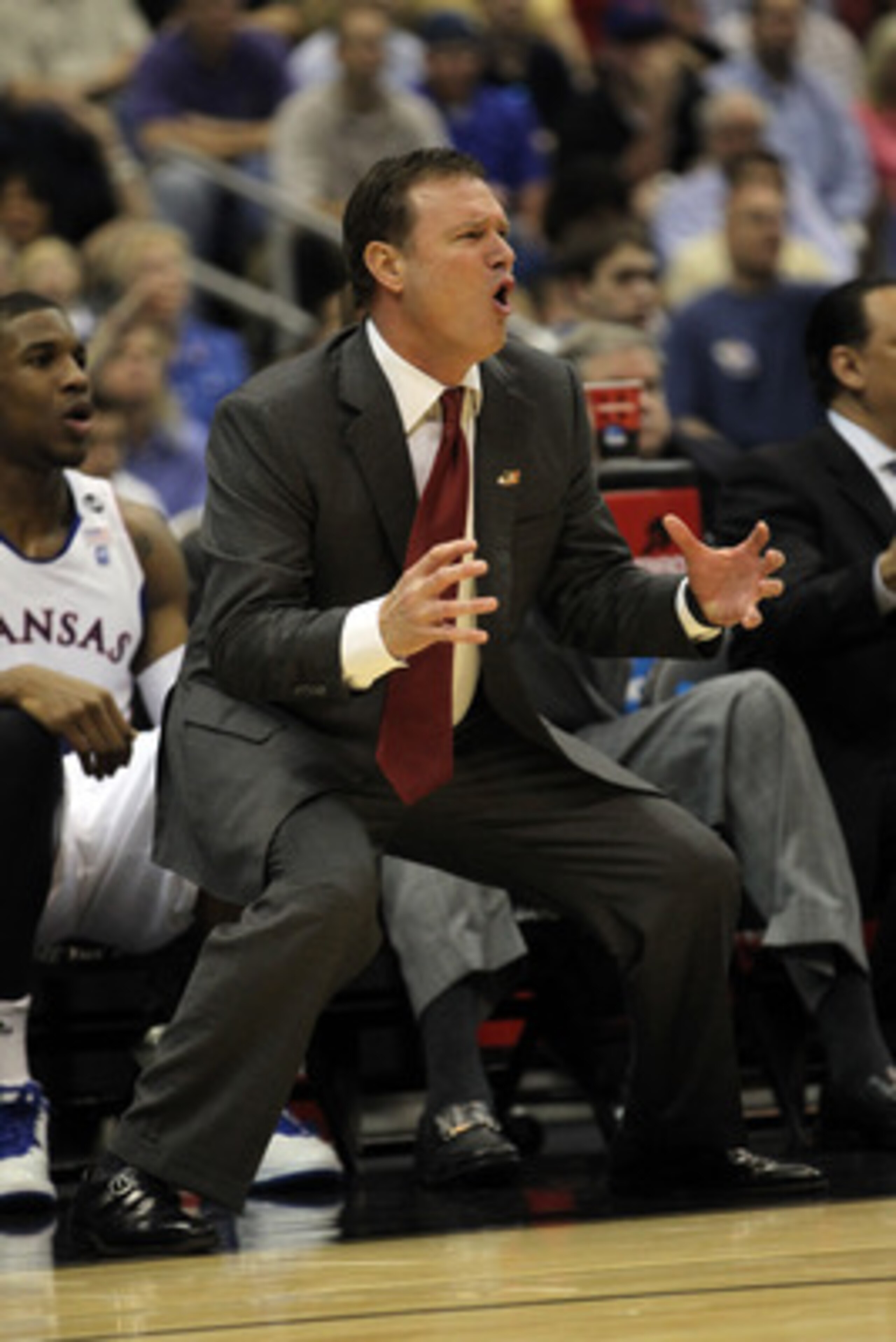 SAN ANTONIO, TX - MARCH 25:  Head coach Bill Self of the Kansas Jayhawks reacts during the southwest regional of the 2011 NCAA men's basketball tournament against the Richmond Spiders at the Alamodome on March 25, 2011 in San Antonio, Texas. Kansas defeat