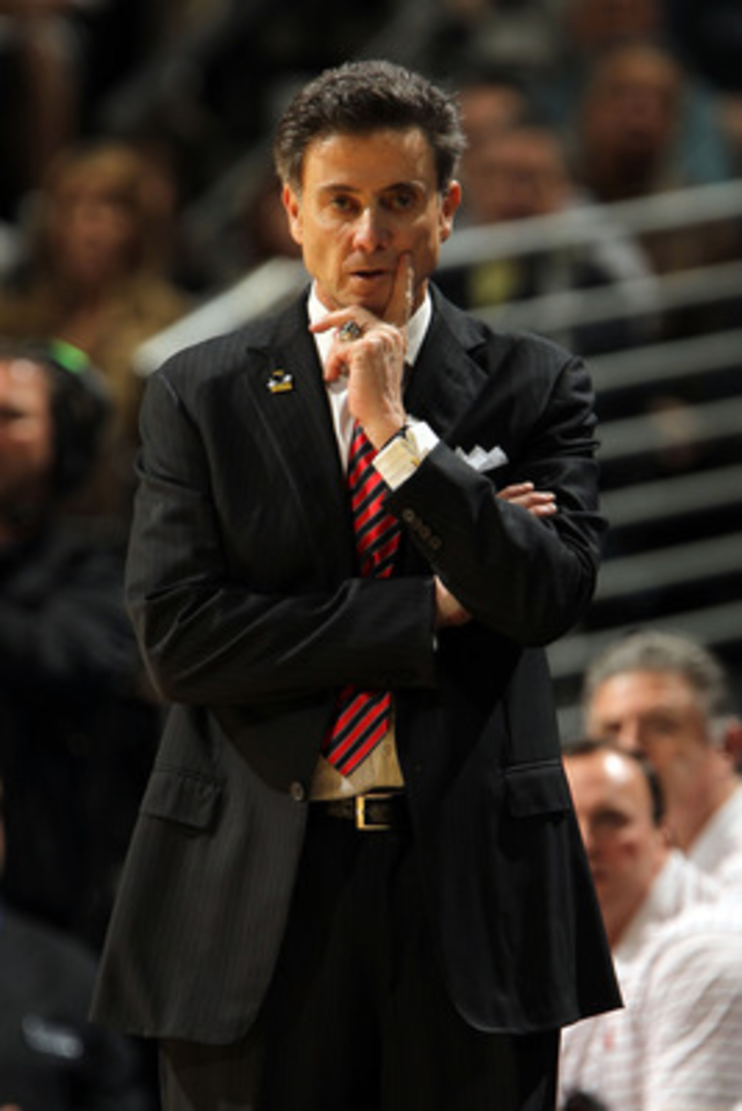 DENVER, CO - MARCH 17:  Head coach Rick Pitino of the Louisville Cardinals looks on from the sidelines against the Morehead State Eagles during the second round of the 2011 NCAA men's basketball tournament at Pepsi Center on March 17, 2011 in Denver, Colo