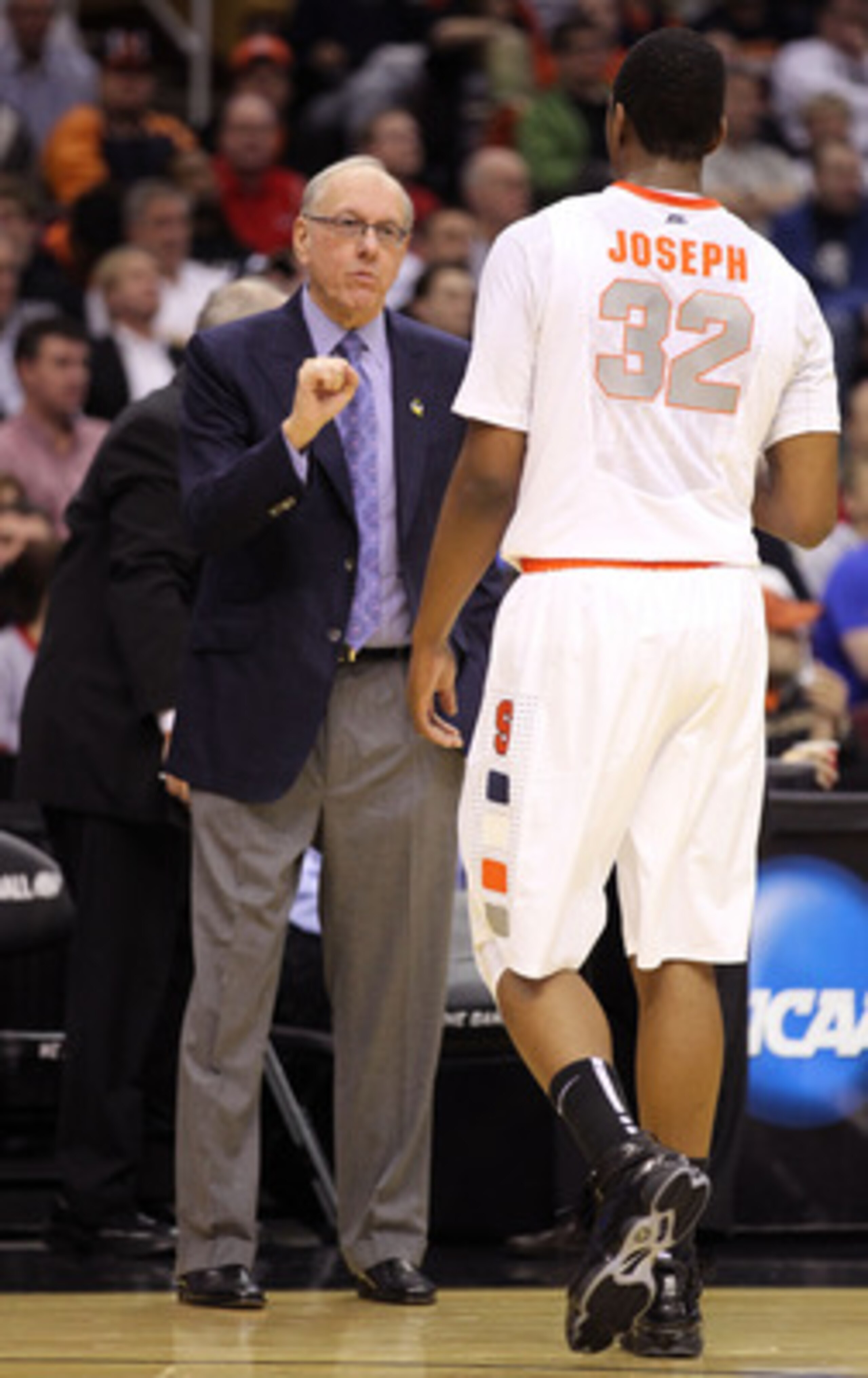 CLEVELAND, OH - MARCH 18: Head coach Jim Boeheim of the Syracuse Orange speaks to Kris Joseph #32 of the Syracuse Orange during the game against the Indiana State Sycamores during the second round of the 2011 NCAA men's basketball tournament at Quicken Lo