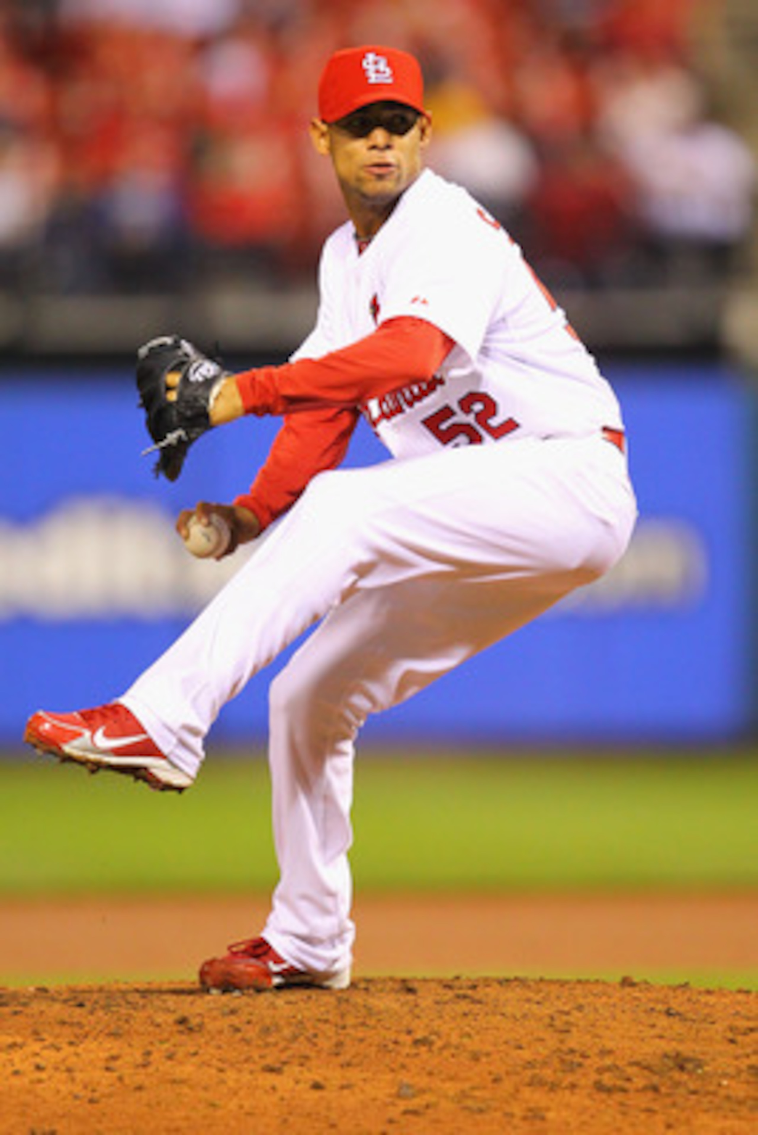 ST. LOUIS, MO - APRIL 22: Reliever Eduardo Sanchez #52 of the St. Louis Cardinals pitches against the Cincinnati Reds at Busch Stadium on April 22, 2011 in St. Louis, Missouri.  (Photo by Dilip Vishwanat/Getty Images)