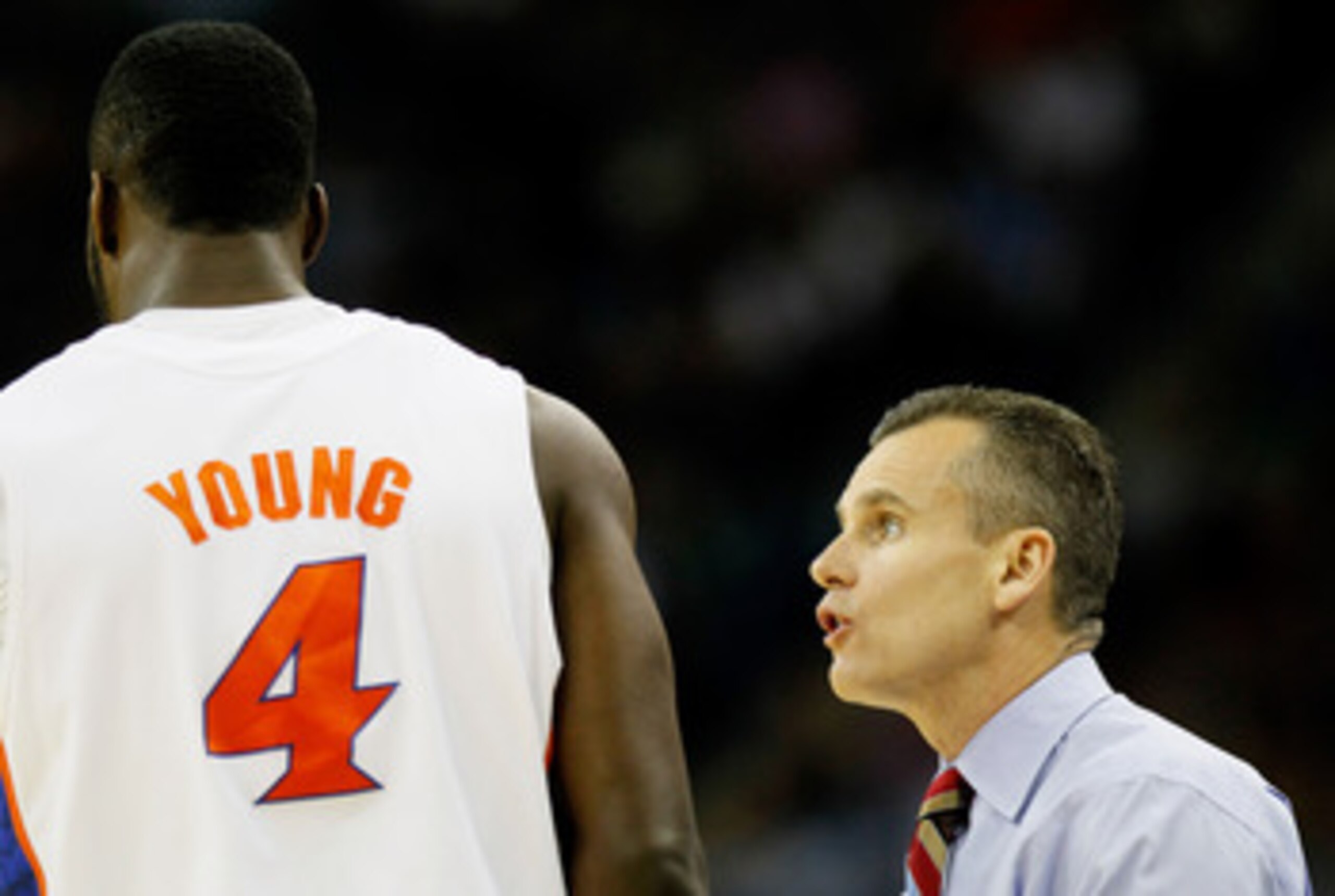 NEW ORLEANS, LA - MARCH 26:  Head coach Billy Donovan talks to Patric Young #4 of the Florida Gators during the second half of their game against the Butler Bulldogs in the Southeast regional final of the 2011 NCAA men's basketball tournament at New Orlea