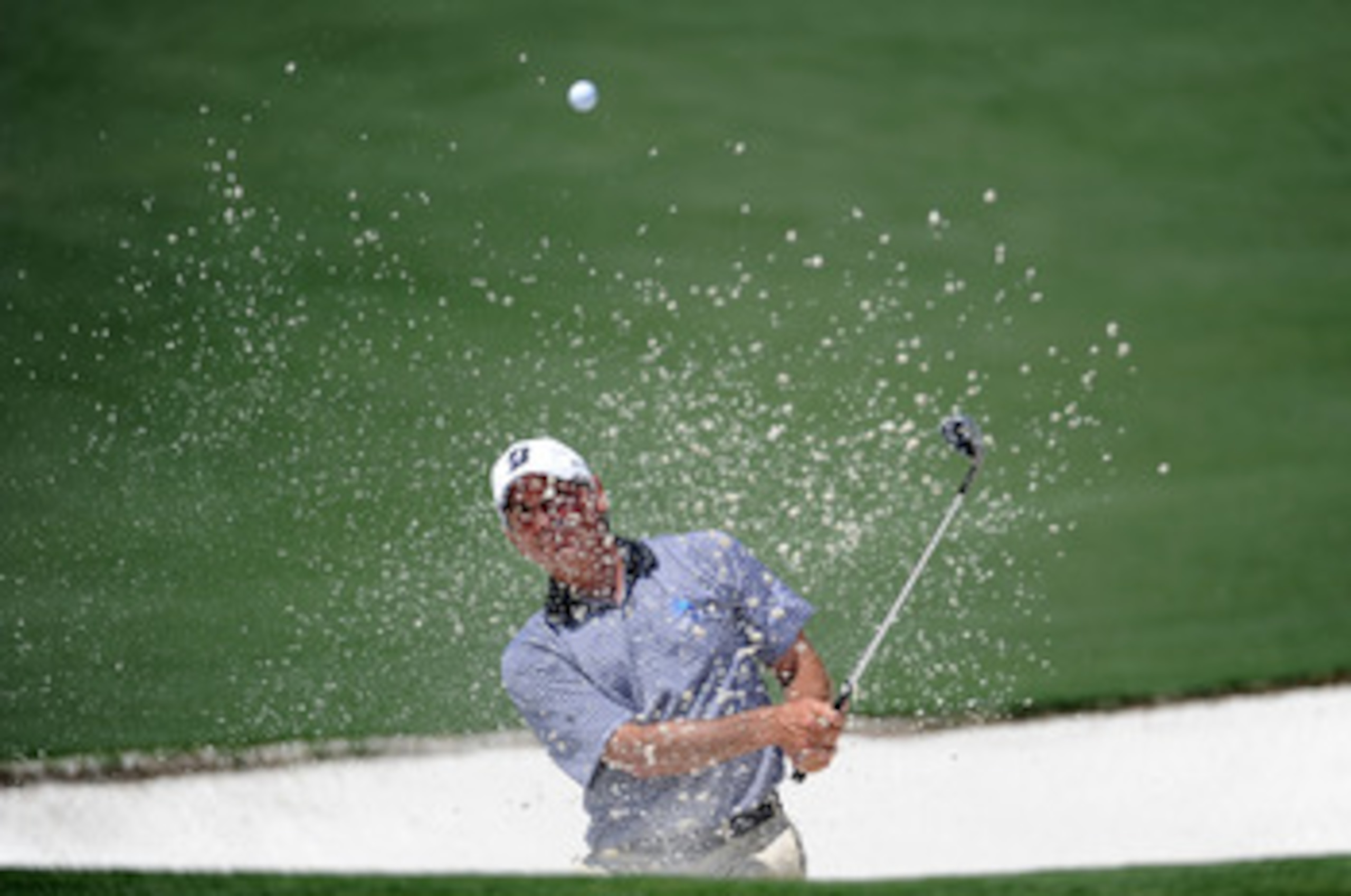 AUGUSTA, GA - APRIL 10:  Fred Couples hits from a bunker during the final round of the 2011 Masters Tournament at Augusta National Golf Club on April 10, 2011 in Augusta, Georgia.  (Photo by Harry How/Getty Images)