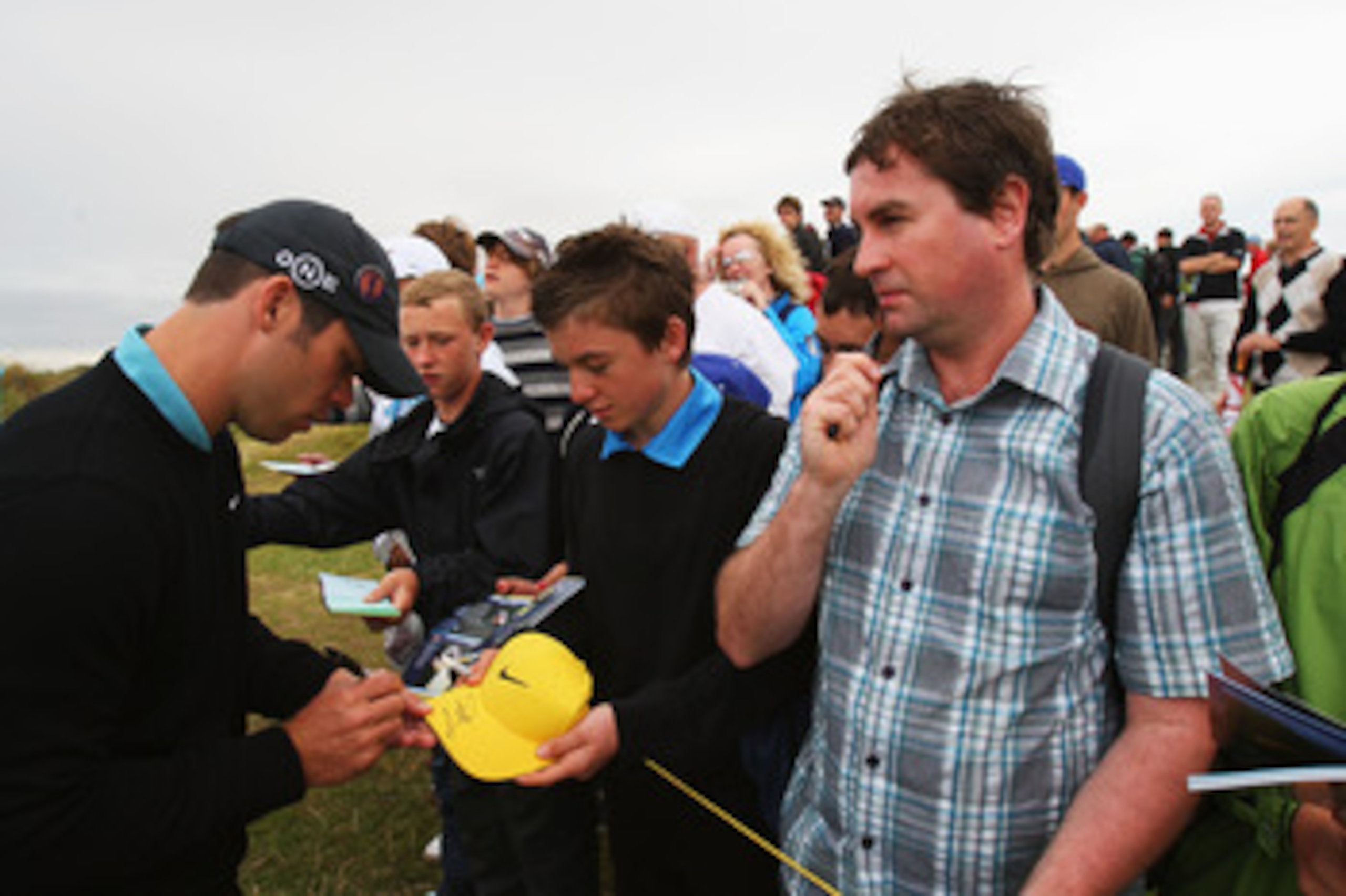 SOUTHPORT, UNITED KINGDOM - JULY 15:  Paul Casey of England signs autographs for fans during the second practice round of the 137th Open Championship on July 15, 2008 at Royal Birkdale Golf Club, Southport, England.  (Photo by Stuart Franklin/Getty Images