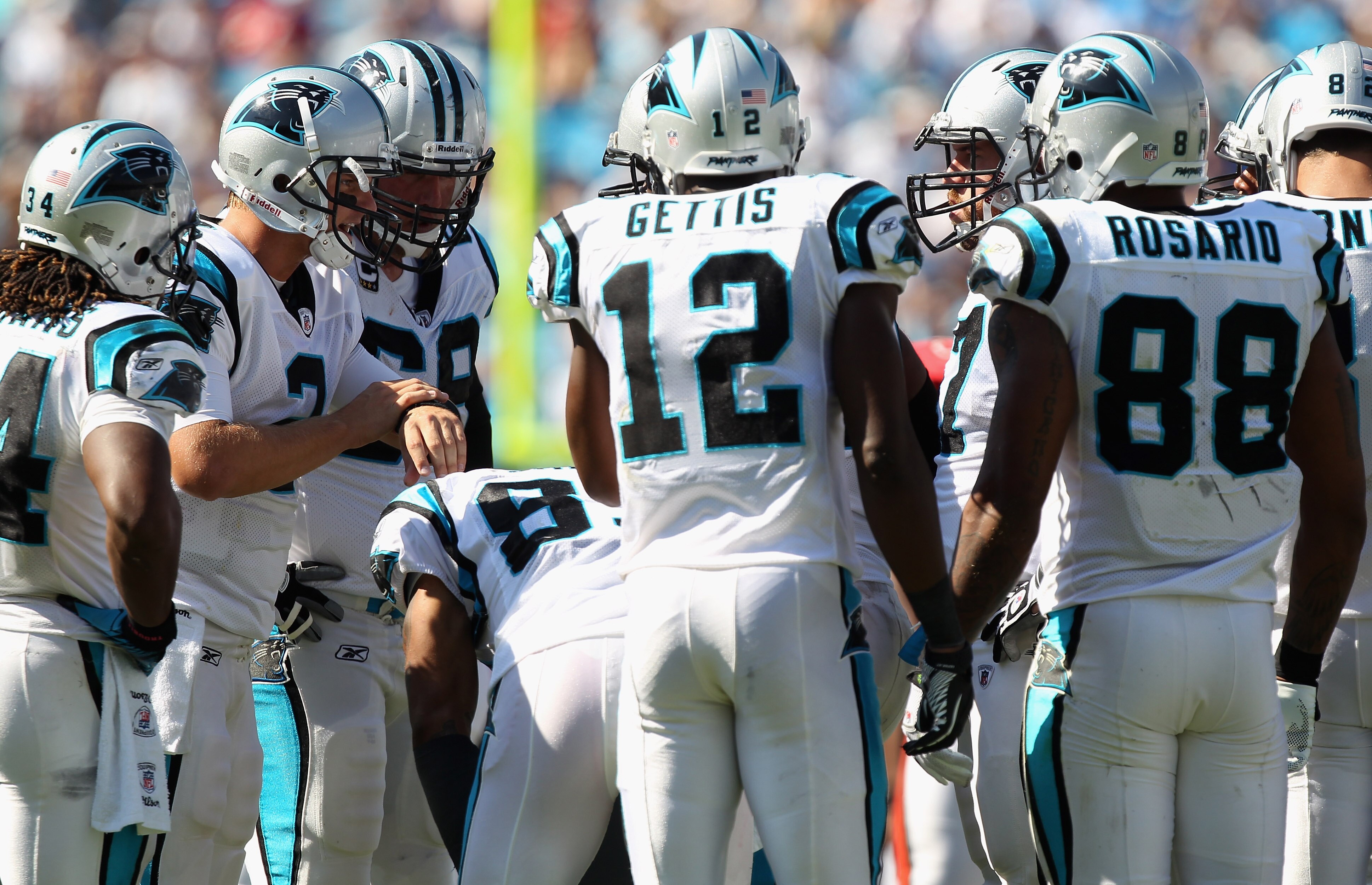 CHARLOTTE, NC - SEPTEMBER 19: Jimmy Clausen #2 of the Carolina Panthers calls a play in the huddle against the Tampa Bay Buccaneers during their game at Bank of America Stadium on September 19, 2010 in Charlotte, North Carolina. (Photo by Streeter Lecka CHARLOTTE, NC - SEPTEMBER 19: Jimmy Clausen #2 of the Carolina Panthers calls a play in the huddle against the Tampa Bay Buccaneers during their game at Bank of America Stadium on September 19, 2010 in Charlotte, North Carolina. (Photo by Streeter Lecka