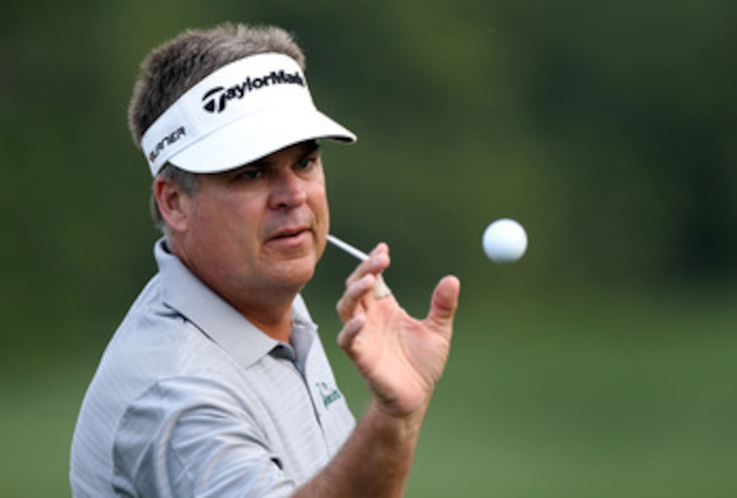 ORLANDO, FL - MARCH 24:  Kenny Perry catches a ball prior to the first round of the Arnold Palmer Invitational presented by MasterCard at the Bay Hill Club and Lodge on March 24, 2011 in Orlando, Florida.  (Photo by Sam Greenwood/Getty Images)