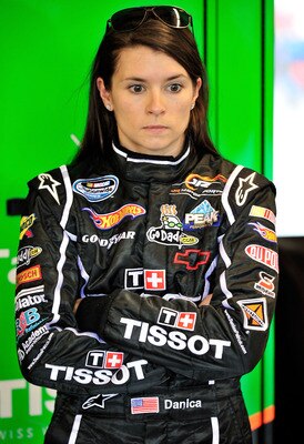 JOLIET, IL - JUNE 04:  Danica Patrick, driver of the #7 Tissot/GoDaddy.com, stands in the garage area after qualifying was cancelled due to rain, for the NASCAR Nationwide Series STP 300 at Chicagoland Speedway on June 4, 2011 in Joliet, Illinois.  (Photo