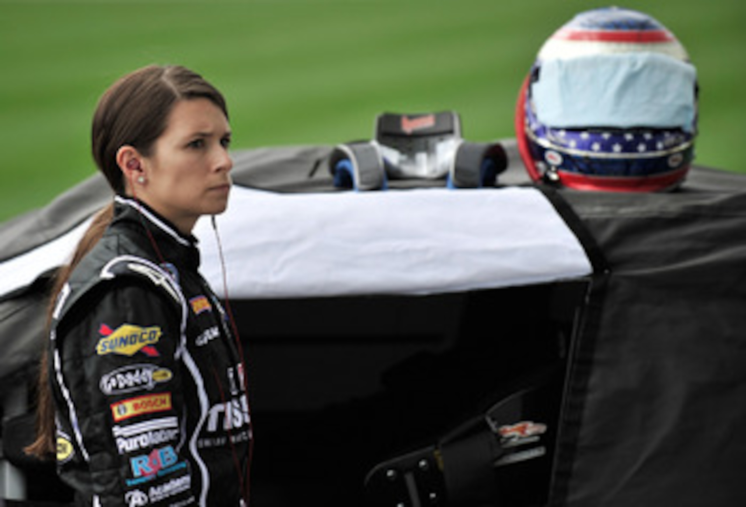 JOLIET, IL - JUNE 04: Danica Patrick, driver of the #7 Tissot/GoDaddy.com, stands on the grid during qualifying for the NASCAR Nationwide Series STP 300 at Chicagoland Speedway on June 4, 2011 in Joliet, Illinois. (Photo by Jason Smith/Getty Images for JOLIET, IL - JUNE 04: Danica Patrick, driver of the #7 Tissot/GoDaddy.com, stands on the grid during qualifying for the NASCAR Nationwide Series STP 300 at Chicagoland Speedway on June 4, 2011 in Joliet, Illinois. (Photo by Jason Smith/Getty Images for