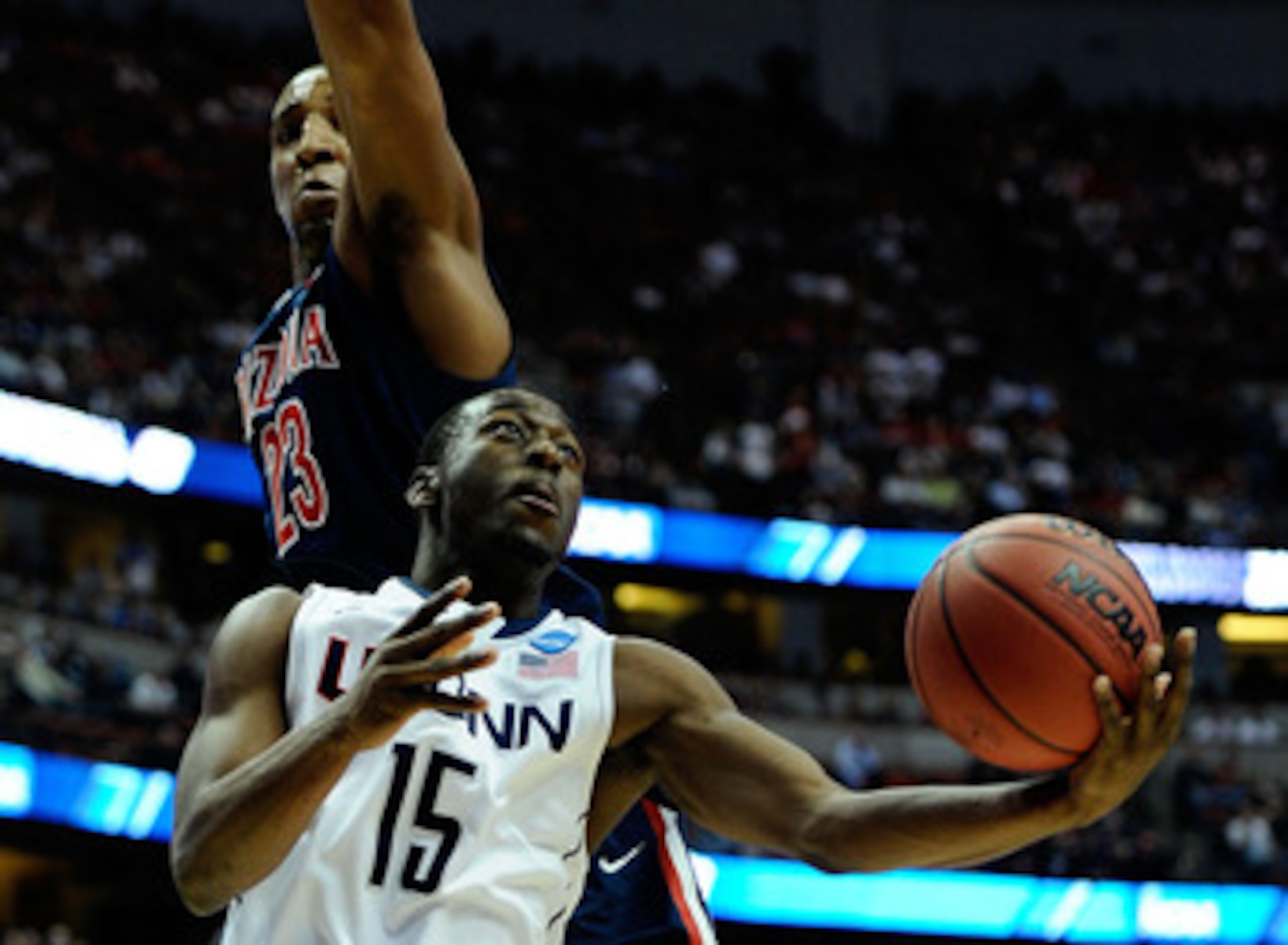 ANAHEIM, CA - MARCH 26: Kemba Walker #15 of the Connecticut Huskies goes to the basket Derrick Williams #23 of the Arizona Wildcats during the west regional final of the 2011 NCAA men's basketball tournament at the Honda Center on March 26, 2011 in Anahe ANAHEIM, CA - MARCH 26: Kemba Walker #15 of the Connecticut Huskies goes to the basket Derrick Williams #23 of the Arizona Wildcats during the west regional final of the 2011 NCAA men's basketball tournament at the Honda Center on March 26, 2011 in Anahe