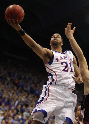 LAWRENCE, KS - MARCH 02:  Markieff Morris #21 of the Kansas Jayhawks shoots during the game against the Texas A&M Aggies on March 2, 2011 at Allen Fieldhouse in Lawrence, Kansas.  (Photo by Jamie Squire/Getty Images)