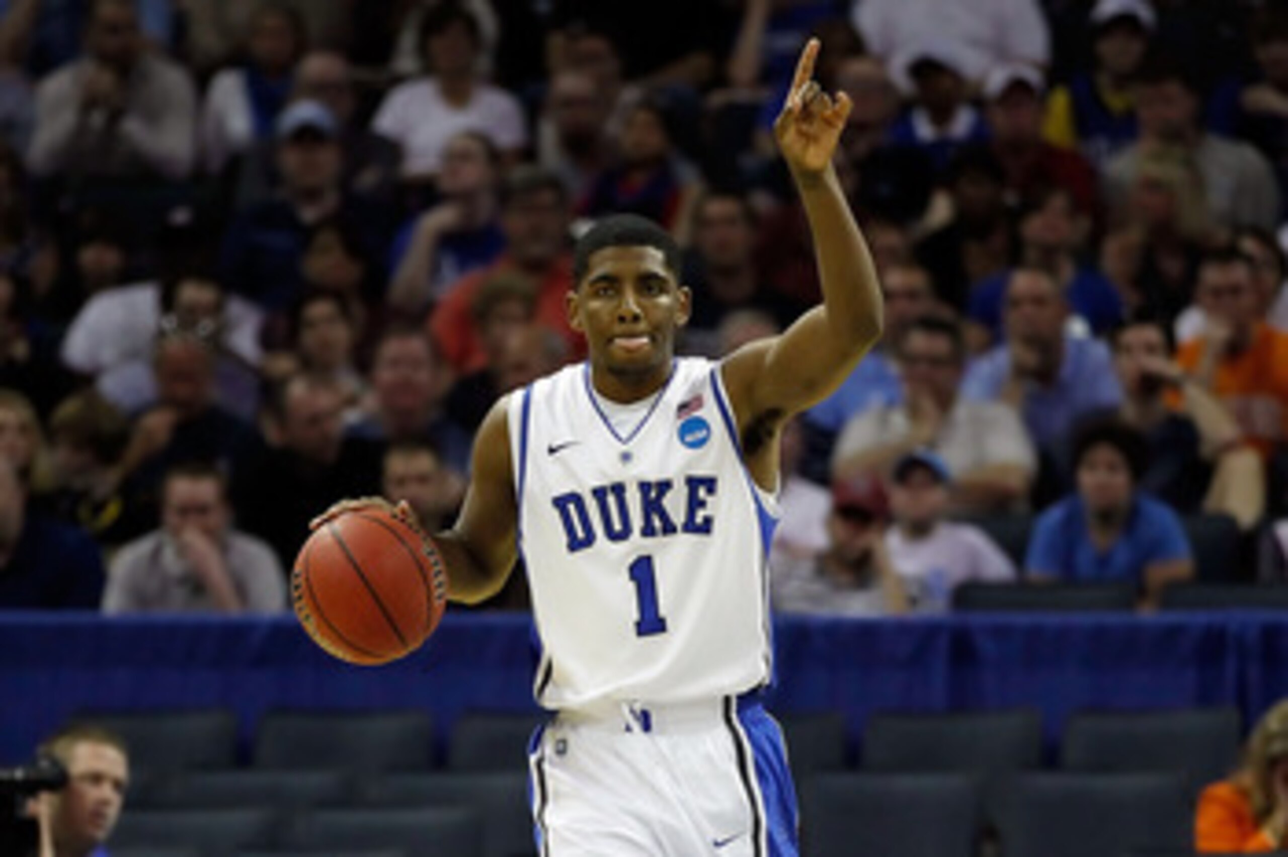 CHARLOTTE, NC - MARCH 18: Kyrie Irving #1 of the Duke Blue Devils calls a play in the first half while taking on the Hampton Pirates during the second round of the 2011 NCAA men's basketball tournament at Time Warner Cable Arena on March 18, 2011 in Char CHARLOTTE, NC - MARCH 18: Kyrie Irving #1 of the Duke Blue Devils calls a play in the first half while taking on the Hampton Pirates during the second round of the 2011 NCAA men's basketball tournament at Time Warner Cable Arena on March 18, 2011 in Char