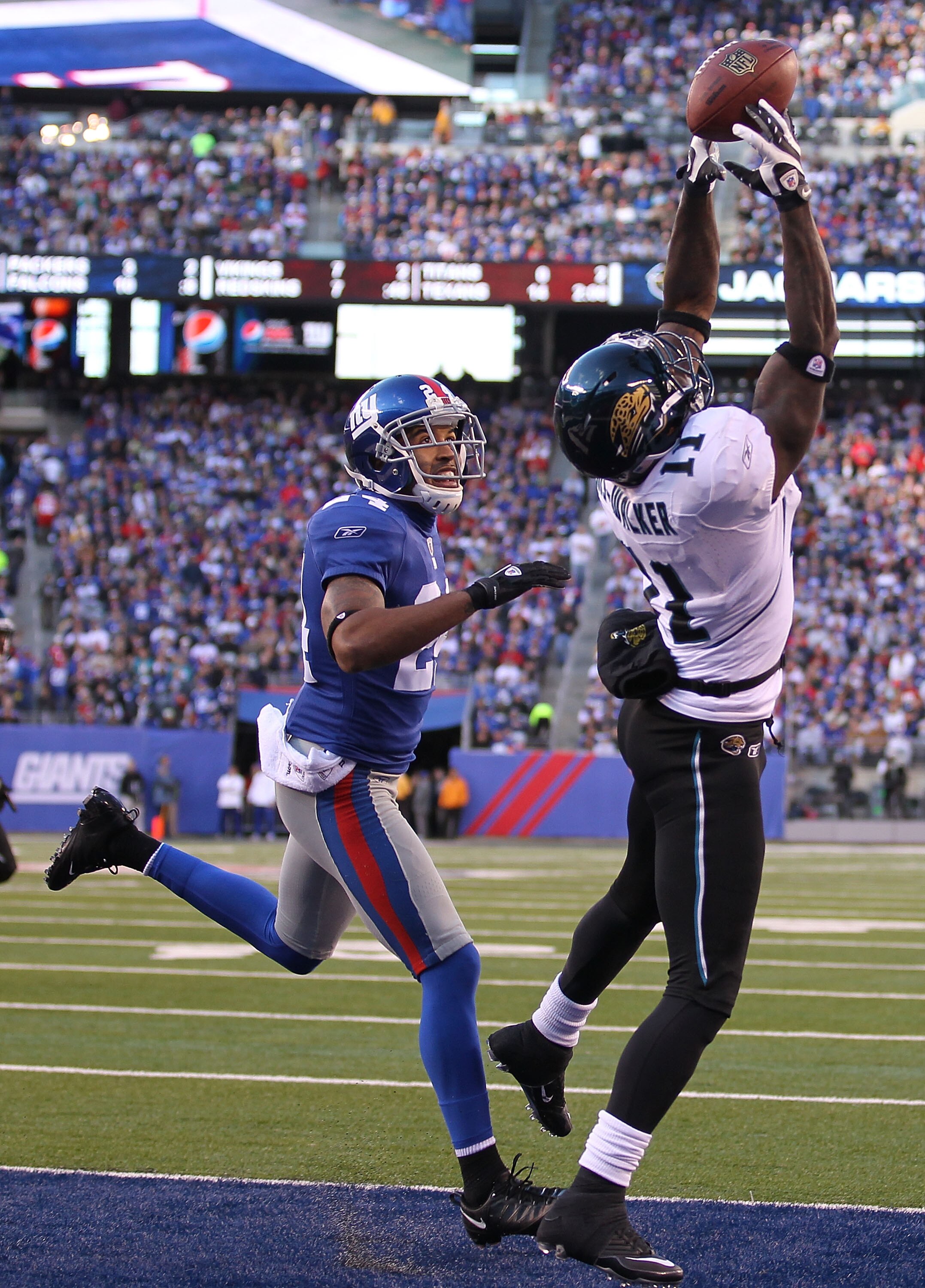 EAST RUTHERFORD, NJ - NOVEMBER 28: Mike Sims Walker #11 of the Jacksonville Jaguars misses the ball as Terrell Thomas #24 of the New York Giants defends during their game on November 28, 2010 at The New Meadowlands Stadium in East Rutherford, New Jersey. EAST RUTHERFORD, NJ - NOVEMBER 28: Mike Sims Walker #11 of the Jacksonville Jaguars misses the ball as Terrell Thomas #24 of the New York Giants defends during their game on November 28, 2010 at The New Meadowlands Stadium in East Rutherford, New Jersey.