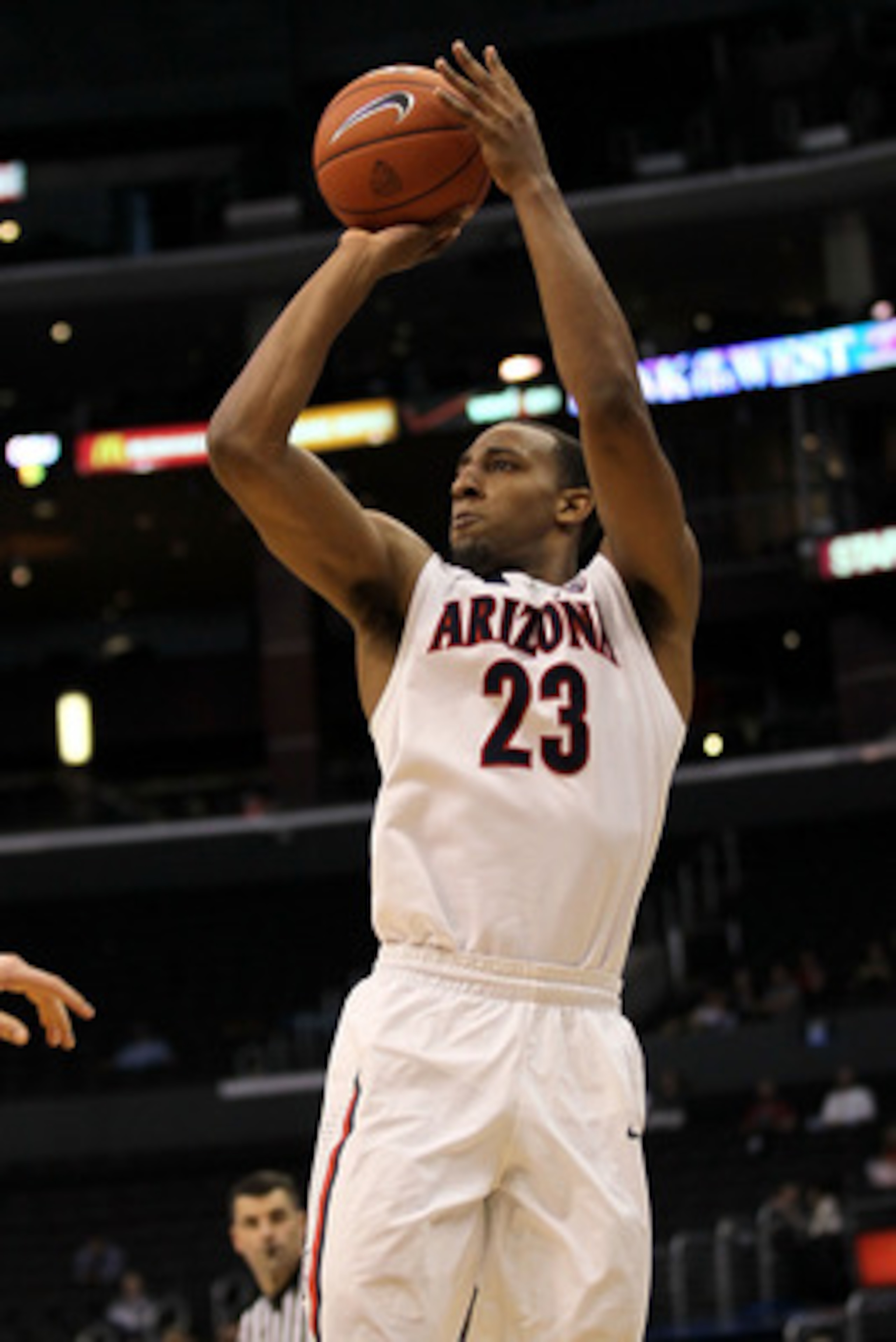 LOS ANGELES, CA - MARCH 10: Derrick Williams #23 of the Arizona Wildcats shoots a three-pointer against the Oregon State Beavers in the second half in the quarterfinals of the 2011 Pacific Life Pac-10 Men's Basketball Tournament at Staples Center on Marc LOS ANGELES, CA - MARCH 10: Derrick Williams #23 of the Arizona Wildcats shoots a three-pointer against the Oregon State Beavers in the second half in the quarterfinals of the 2011 Pacific Life Pac-10 Men's Basketball Tournament at Staples Center on Marc