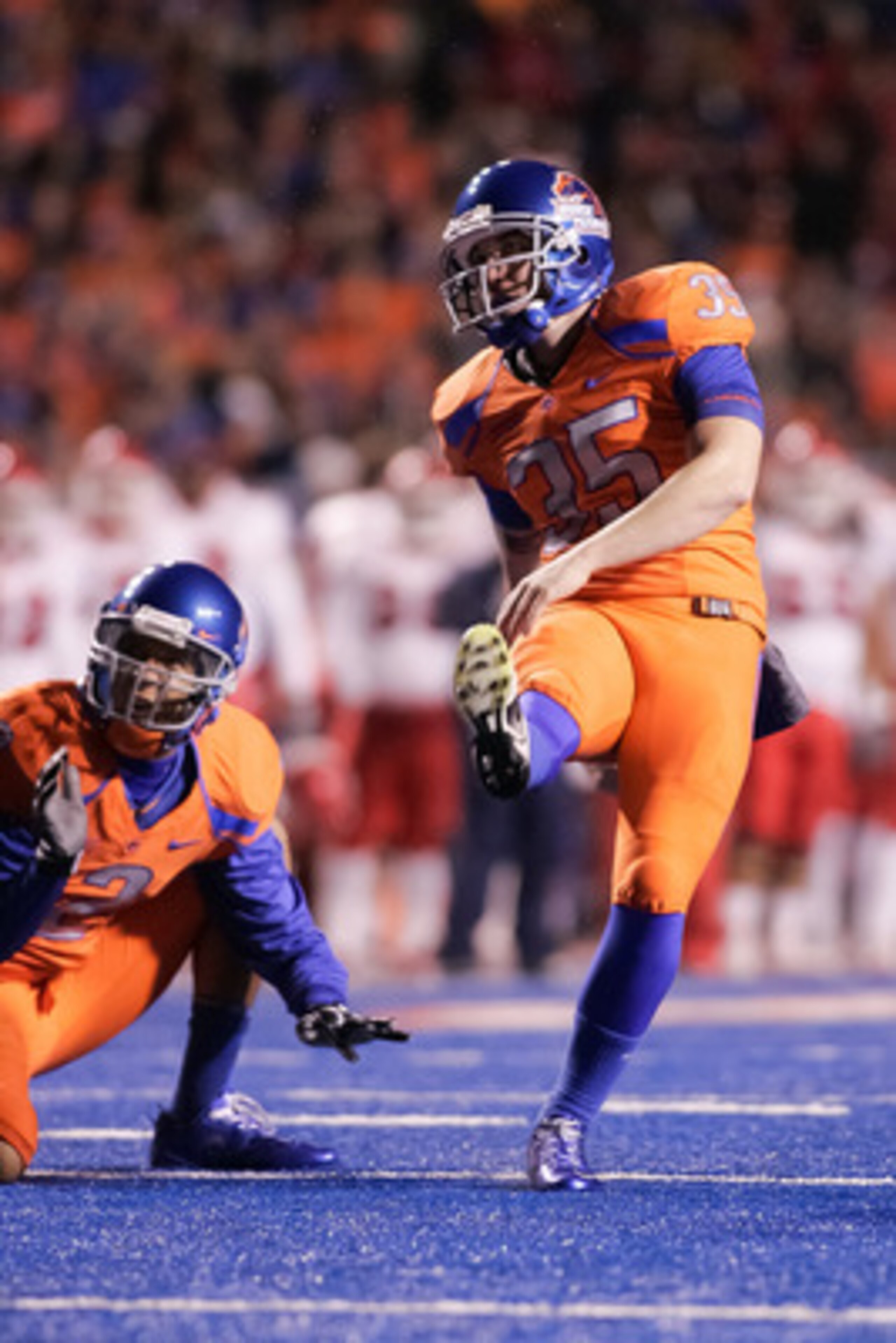 BOISE, ID - NOVEMBER 19:  Kyle Brotzman #35 of the Boise State Broncos kicks an extra point against the Fresno State Bulldogs at Bronco Stadium on November 19, 2010 in Boise, Idaho.  On his next kick Brotzman would break the Boise State all-time scoring r