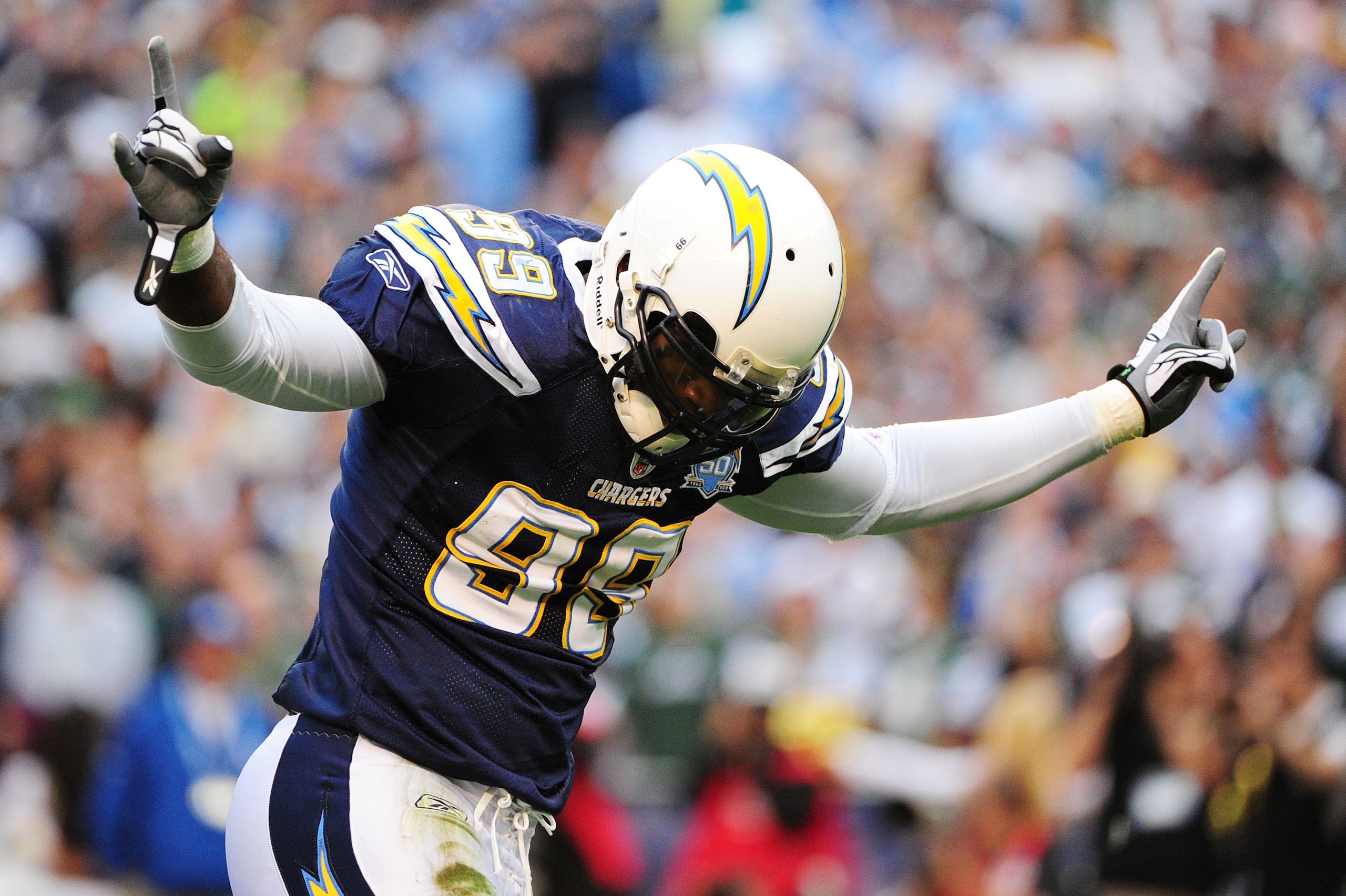 SAN DIEGO - JANUARY 17:  Linebacker Kevin Burnett #99 of the San Diego Chargers celebrates a play against the New York Jets during the AFC Divisional Playoff Game at Qualcomm Stadium on January 17, 2010 in San Diego, California.  (Photo by Robert Laberge/