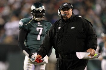 PHILADELPHIA, PA - DECEMBER 02:  Head coach Andy Reid of the Philadelphia Eagles throws the red challenge flag on a play involving Brent Celek #87 in the second half as Michael Vick #7 looks on against the Houston Texans at Lincoln Financial Field on Dece